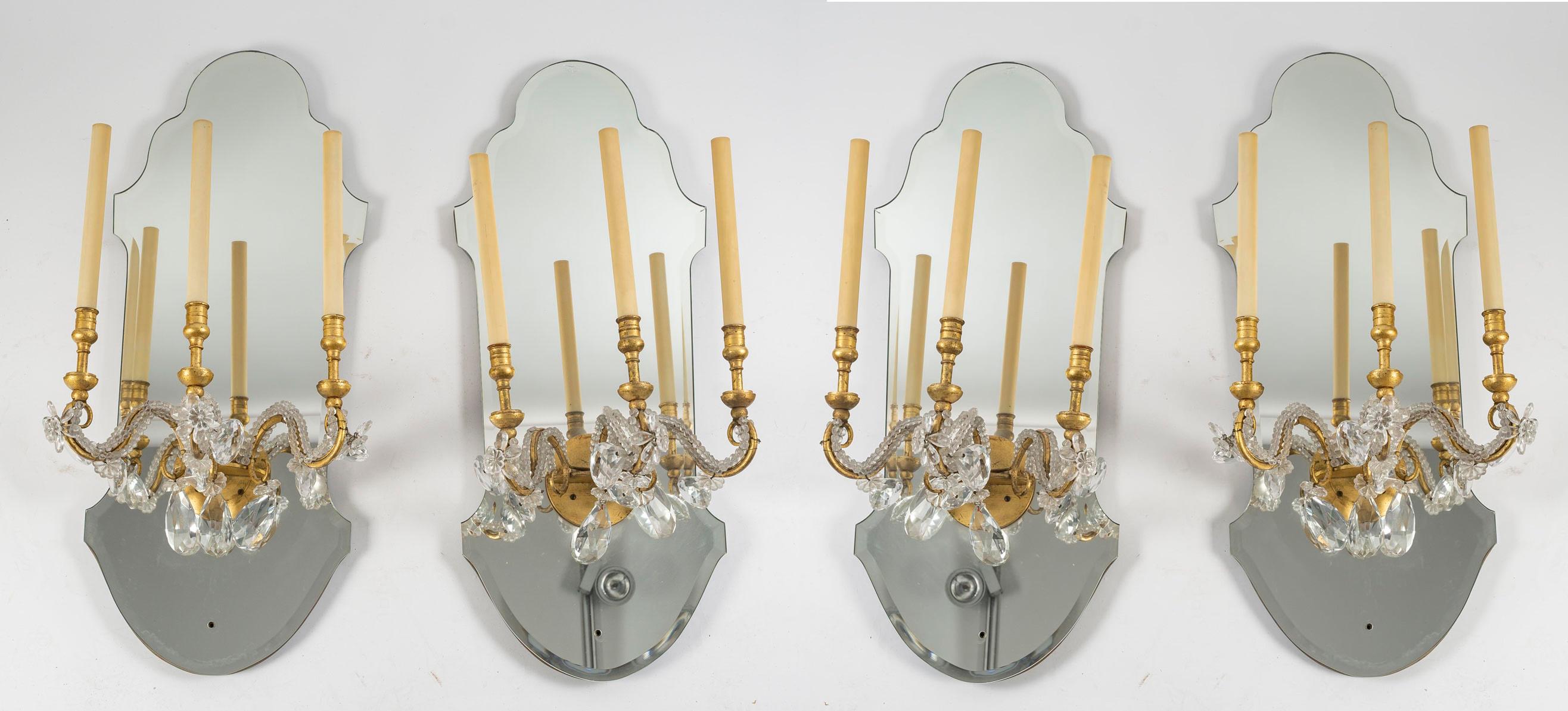 Suite of 6 gilded iron and mirror sconces with glass drops, 1950-1960.

Suite of 6 Delisle sconces, 1950-1960, in mirror and gilded iron with glass drops.  
h: 85cm, w: 33cm, d: 30cm