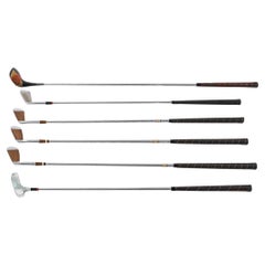 Suite of 6 Golf Clubs from the 1950s.