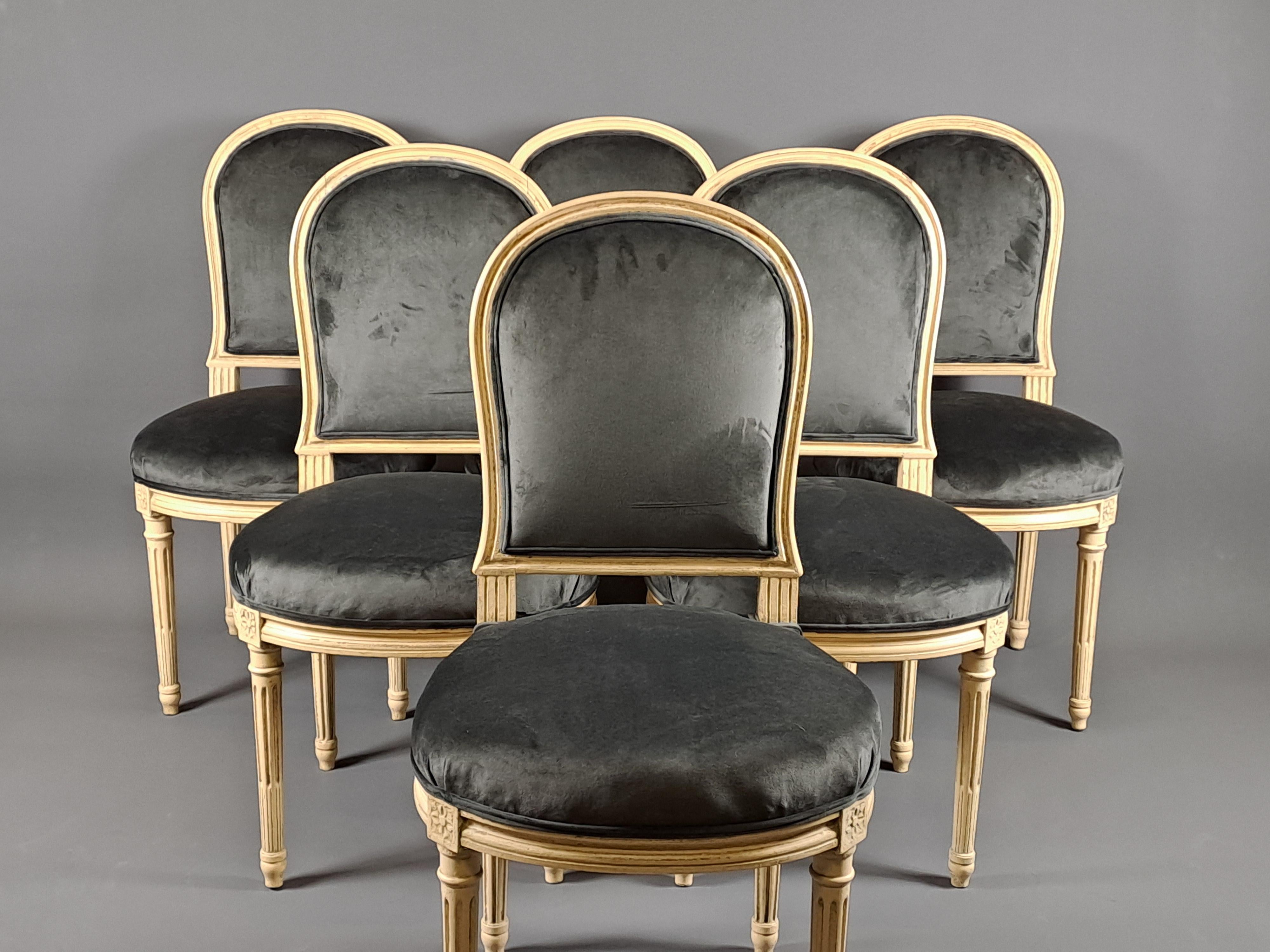 Set of 6 Louis XVI style chairs in cream lacquered wood after a model by Jacob with hot air balloon-shaped backrest and large oblong seat.

The fabric has been changed by our upholstery, satin velvet style fabric in taupe brown color (we can send