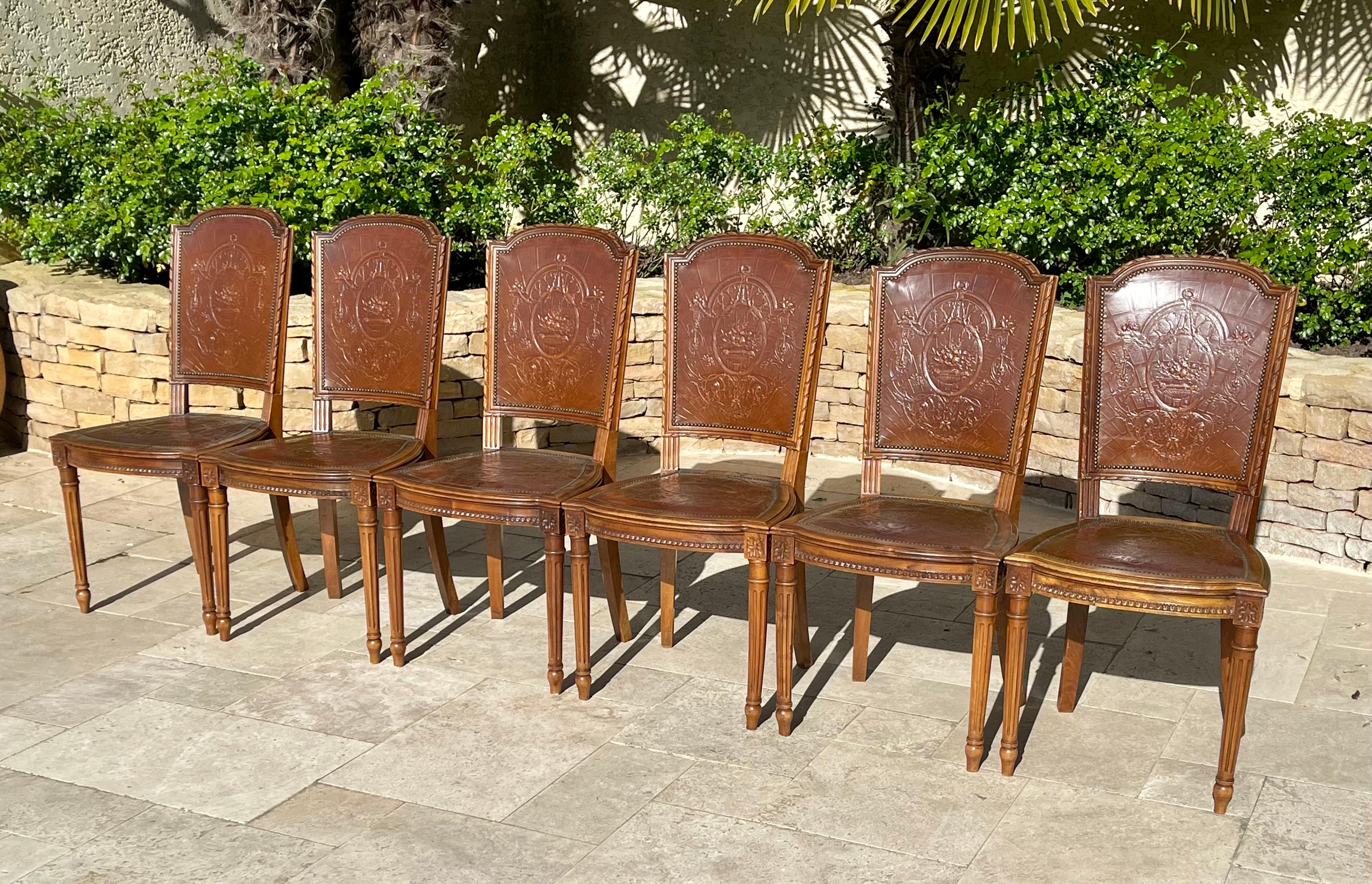 French Suite of 6 Louis XVI Style Walnut and Cordoba Leather Chairs For Sale