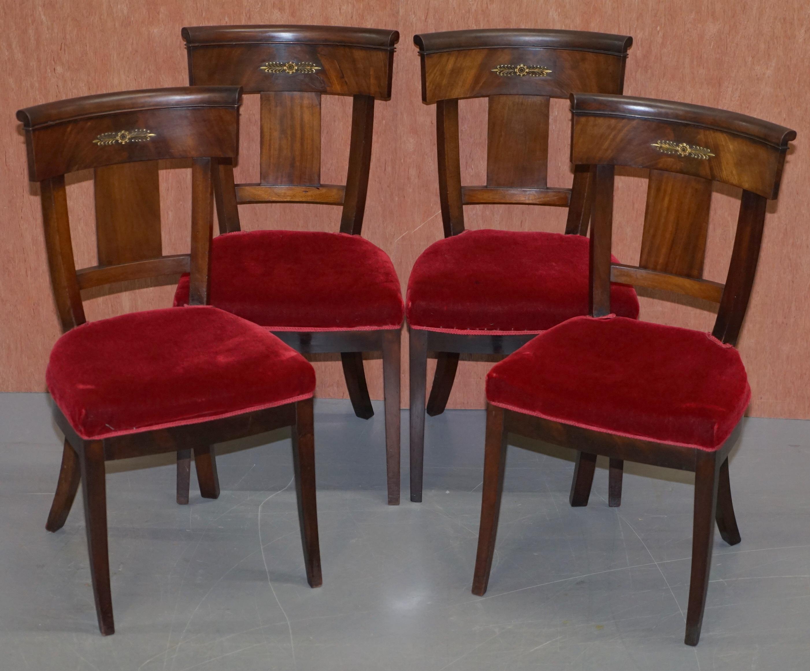 We are delighted to offer for sale this lovely suite of six original Napoleon III French Empire Revival mahogany and bronze mounted dining chairs

A good original suite, you have four standard chairs and then an old His and Hers pair of carvers