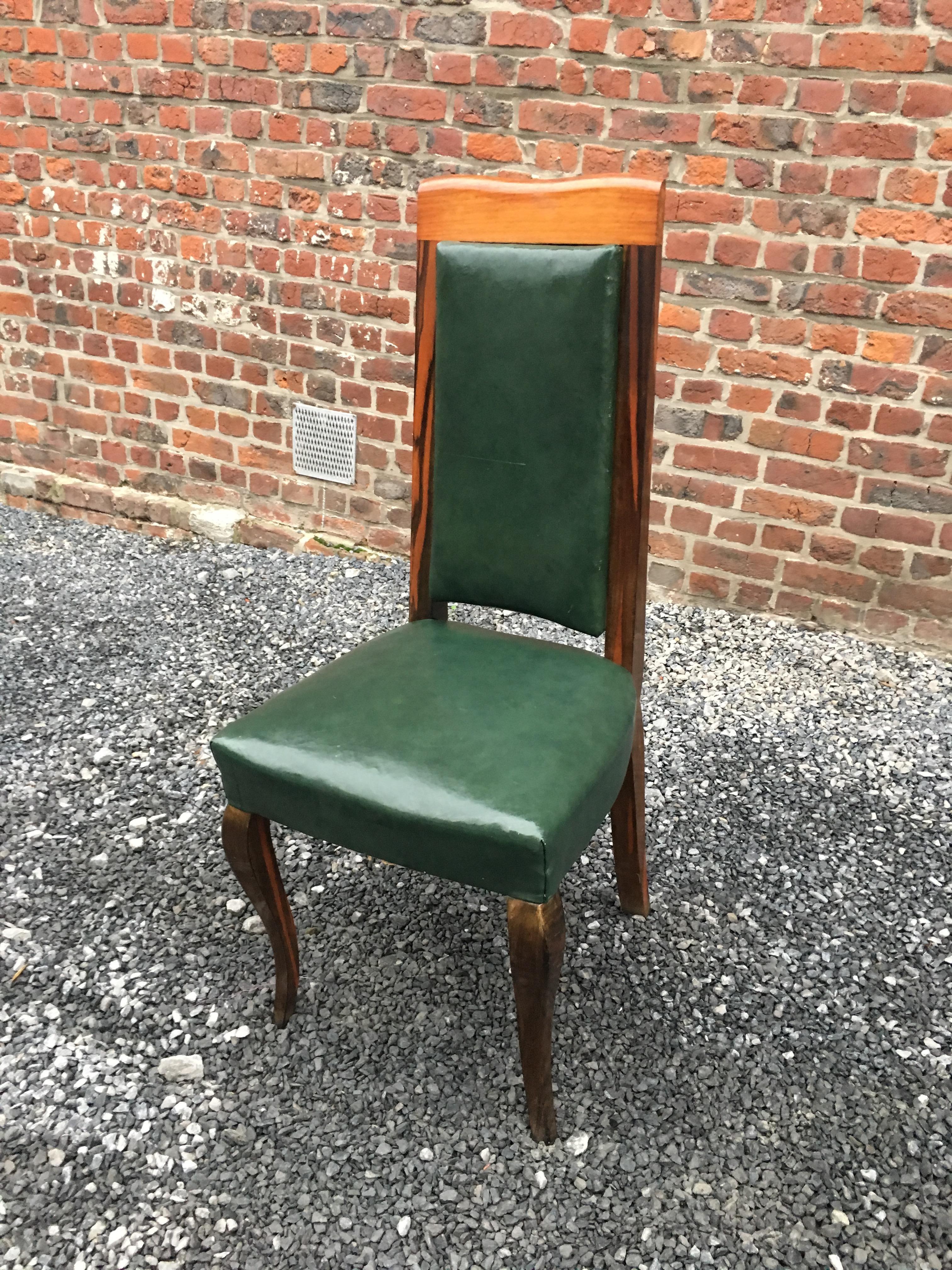 Suite of 8 Art Deco chairs in Macassar ebony, mahogany and leather
The general condition is very good
tiny scratches on the leather,.
Do not require a complete restoration.