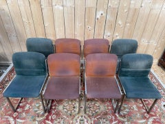 Suite of 8 chairs – 1970 period – Stainless steel sled base