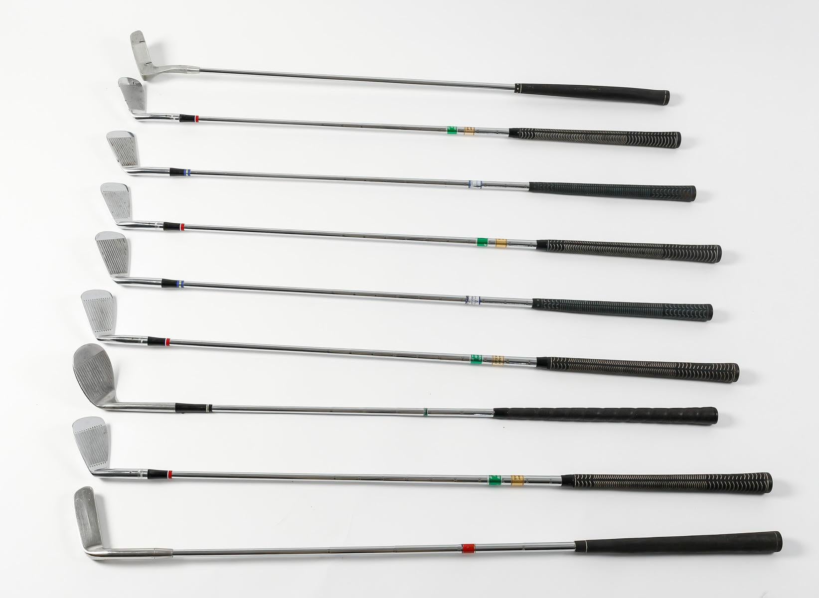 Mid-Century Modern Suite of 9 Golf Clubs from the 1960s. For Sale