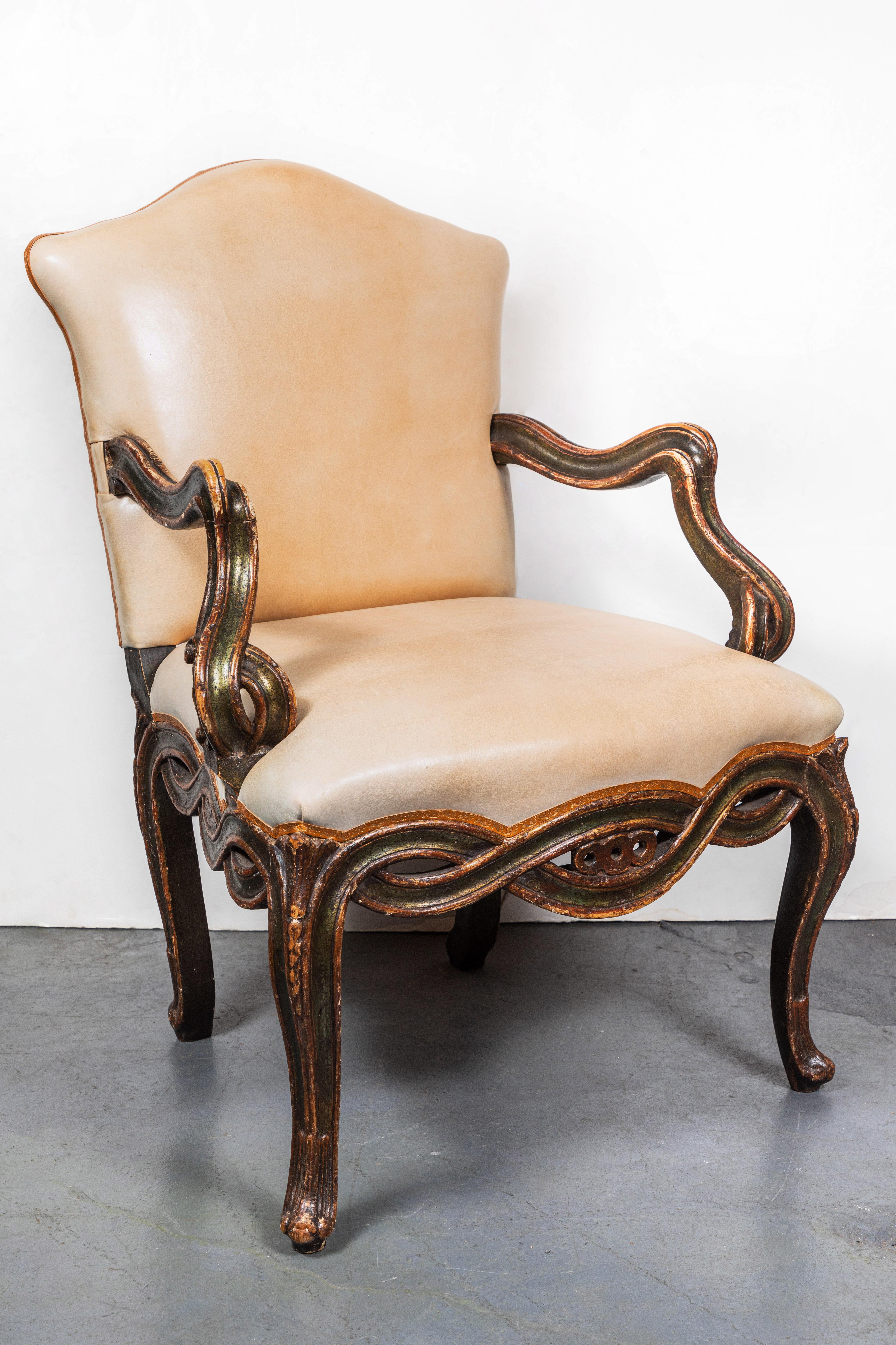 A remarkable set of four, petite, 19th century, hand carved and painted, parcel-gilt, Venetian armchairs with remarkable, pierced, serpentine woodwork. Throughout. Sold as two sets of two, or as an entire ensemble.