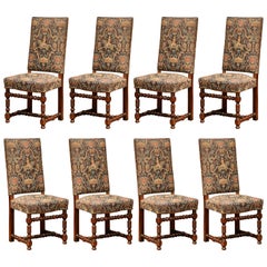 Suite of Eight French Louis XIII Carved Walnut and Tapestry Dining Room Chairs