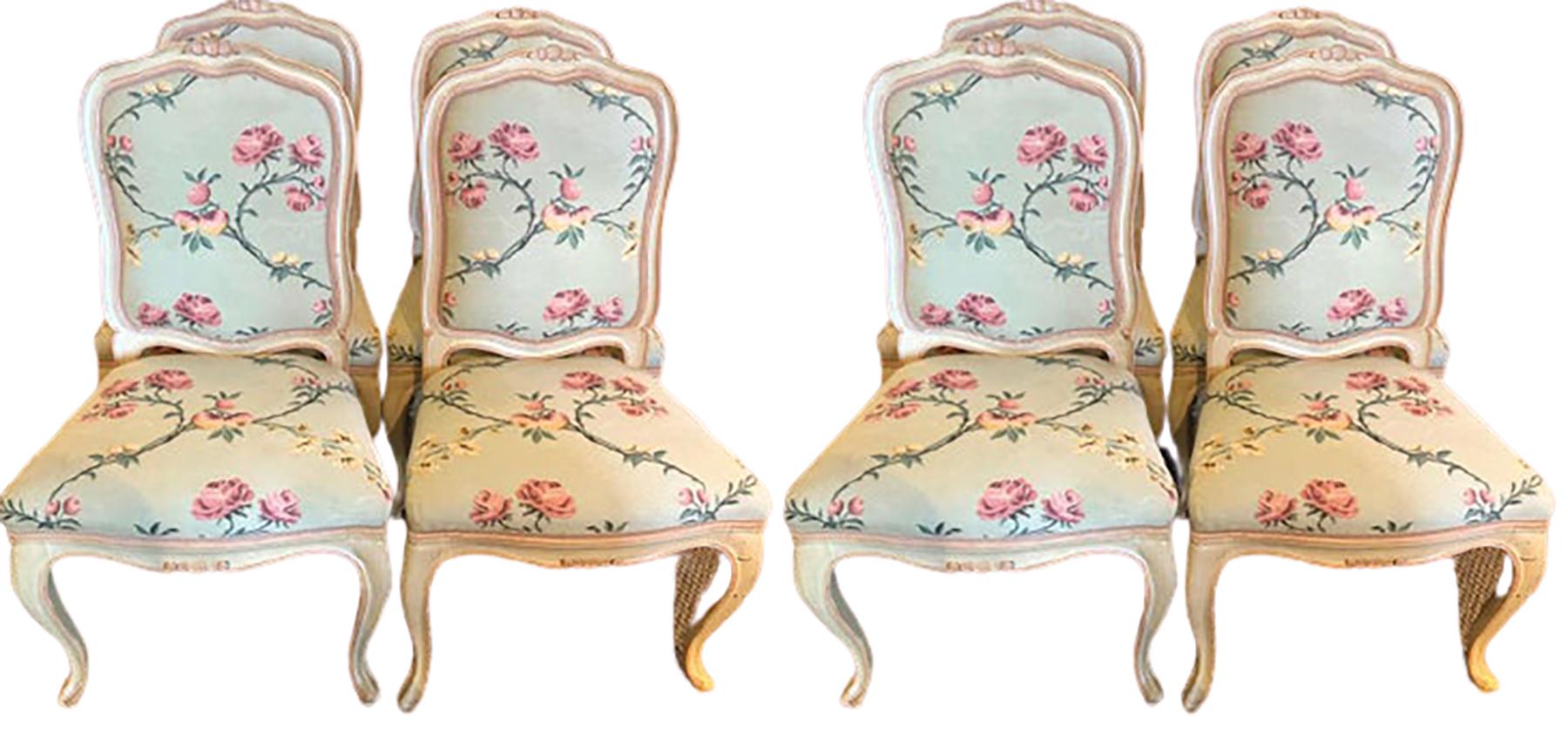 Suite of eight Louis XV style polychrome chairs, 20th century, each with a carved serpentine crest over a conforming padded back, above a like seat and a carved apron, raised on cabriole legs ending in pad feet. All stamped Made in Italy. Can