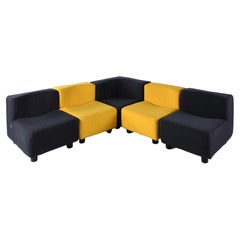 Suite of five armchairs forming a large modular sofa, foam and fabric