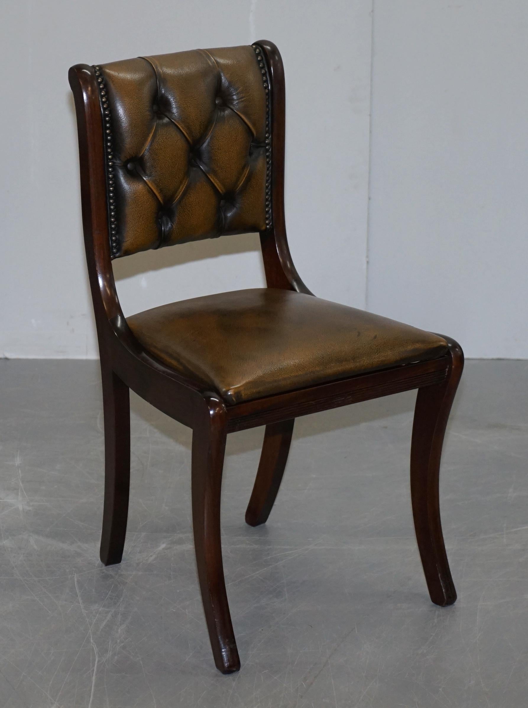 We are delighted to offer for sale this lovely suite of four petrol brown coloured Chesterfield dining chairs with Mahogany frames 

A very good looking and decorative set of chairs, the colour is a petrol brown which has a slight green tinge to