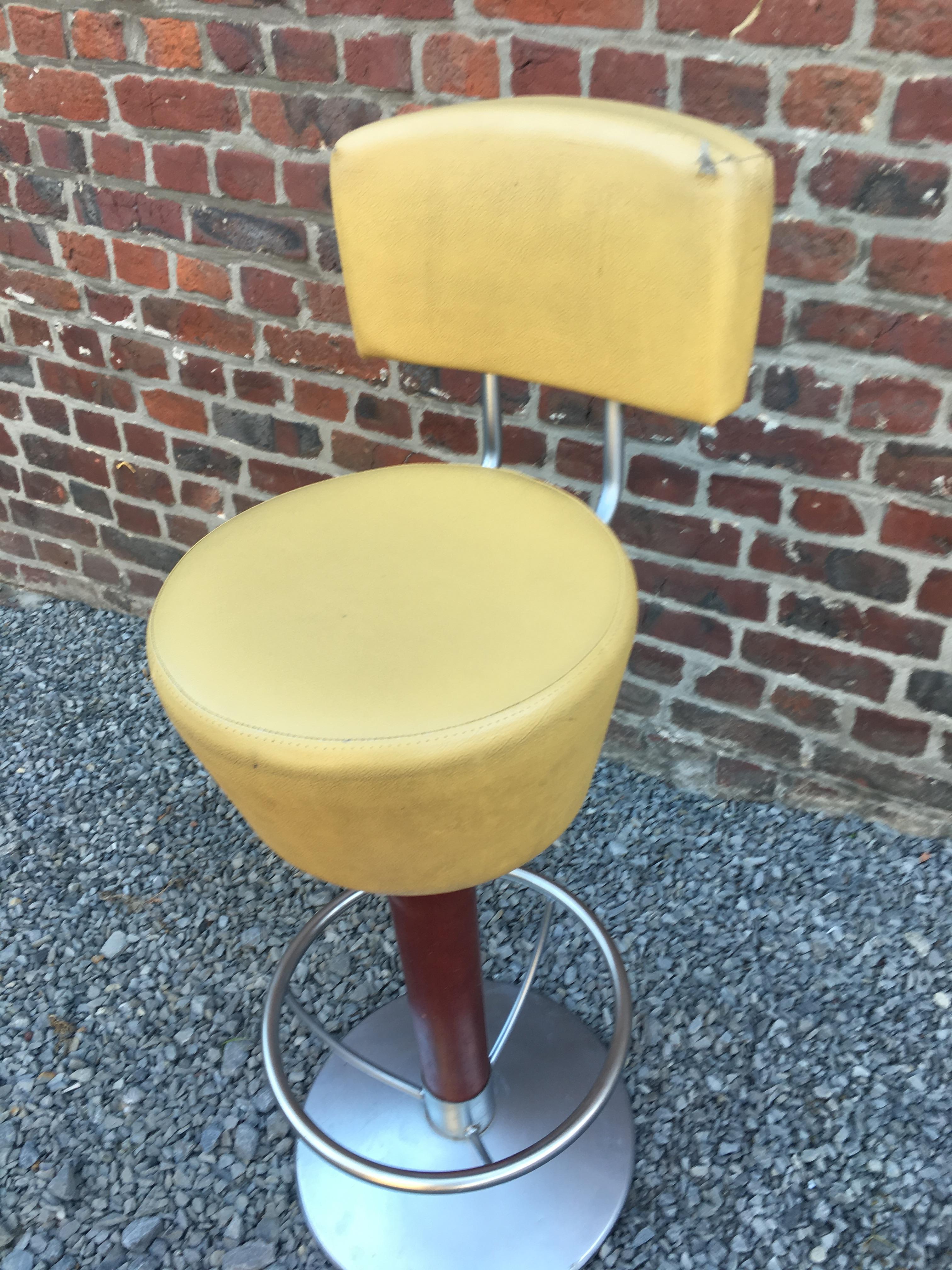 French Suite of Four Bar Stools, Stained Beech, Steel and Faux Leather, circa 1970 For Sale