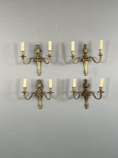 Set di quattro applique in bronzo, stile Luigi XVI, XX secolo