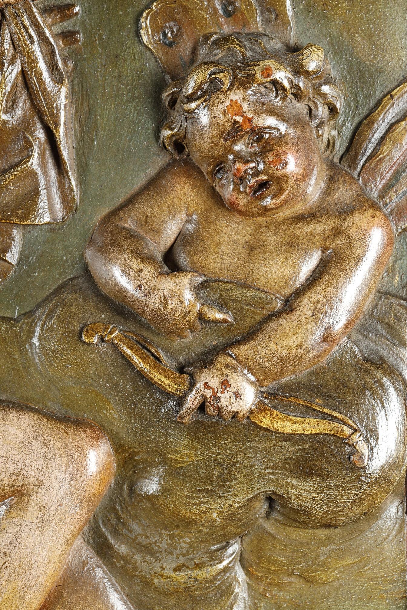 Suite of four carved basswood panels from the 18th century 11