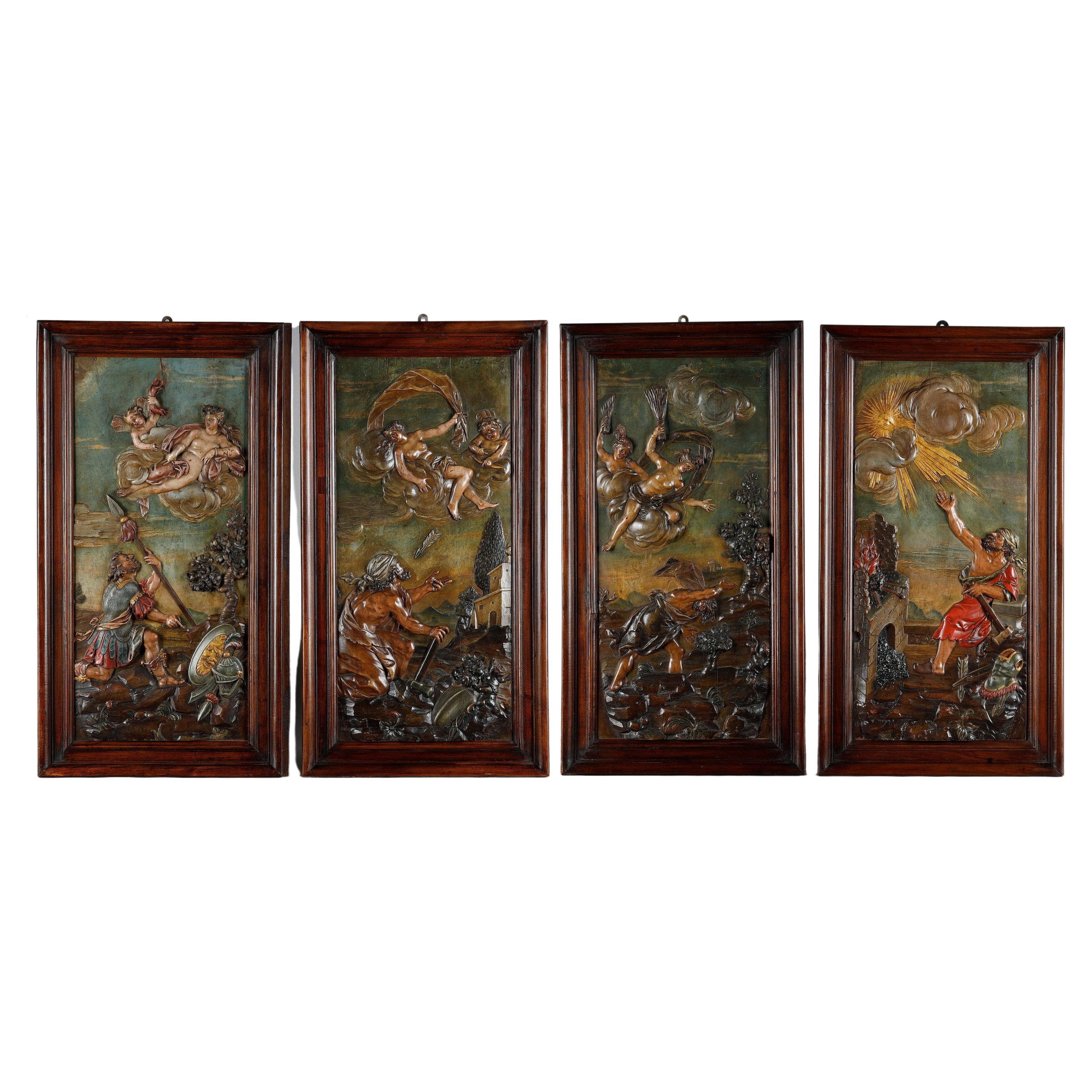 Suite aus vier geschnitzten Bassholzplatten aus dem 18. Jahrhundert