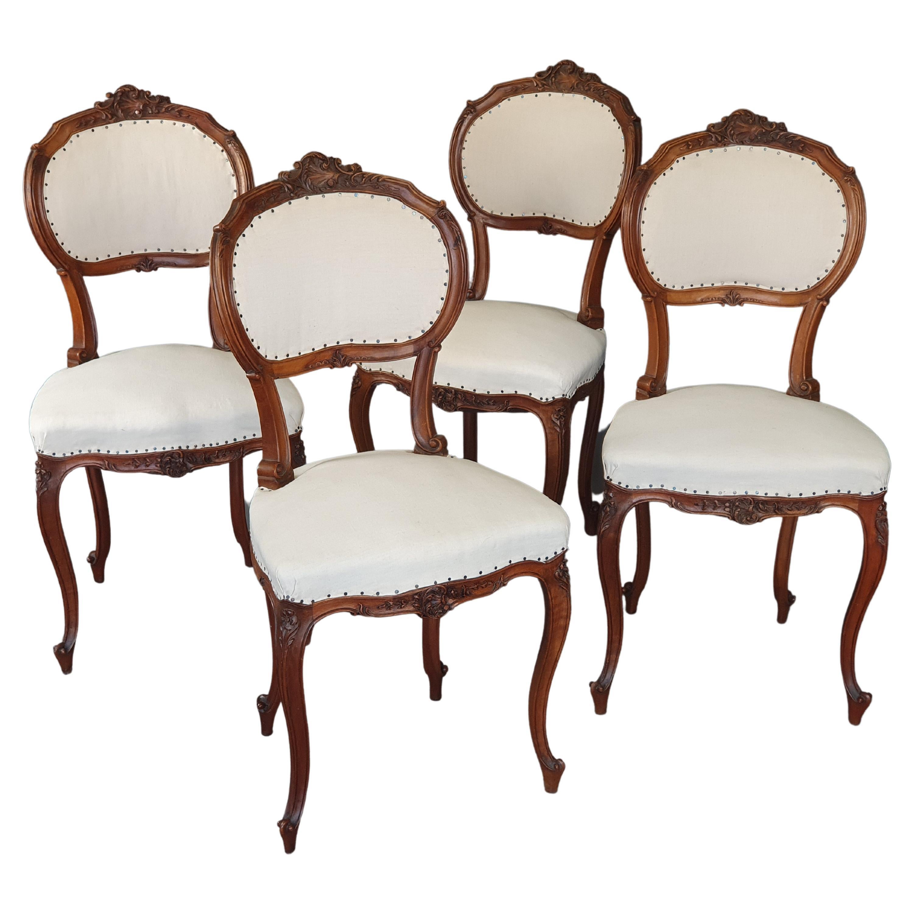 Suite of Four Louis XV Rocaille Chairs