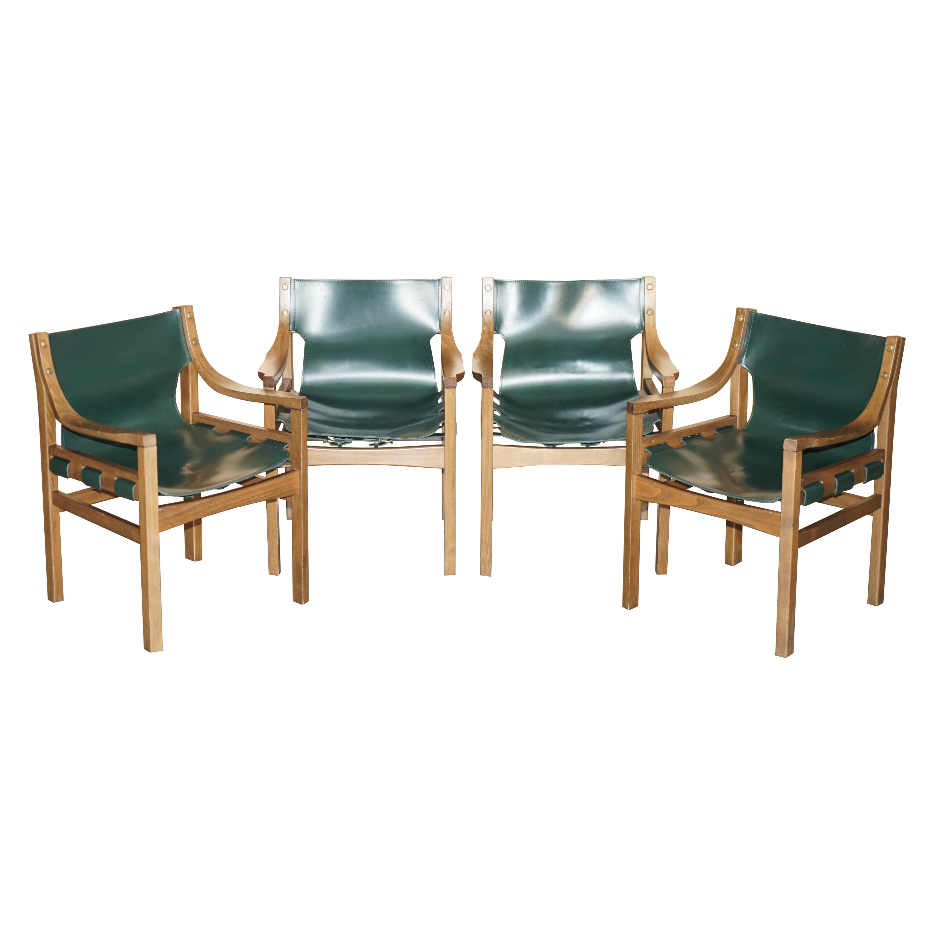 SUITE OF FOUR OLD LIVONI WALNUT FRAMED GREEN SADDLE LEATHER ARMCHAiRS For Sale