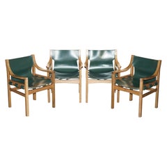 SUITE OF FOUR OLD LIVONI WALNUT FRAMED GREEN SADDLE LEATHER ARMCHAiRS SUITE OF FOUR OLD LIVONI WALNUT FRAMED GREEN SADDLE LEATHER ARMCHAiRS