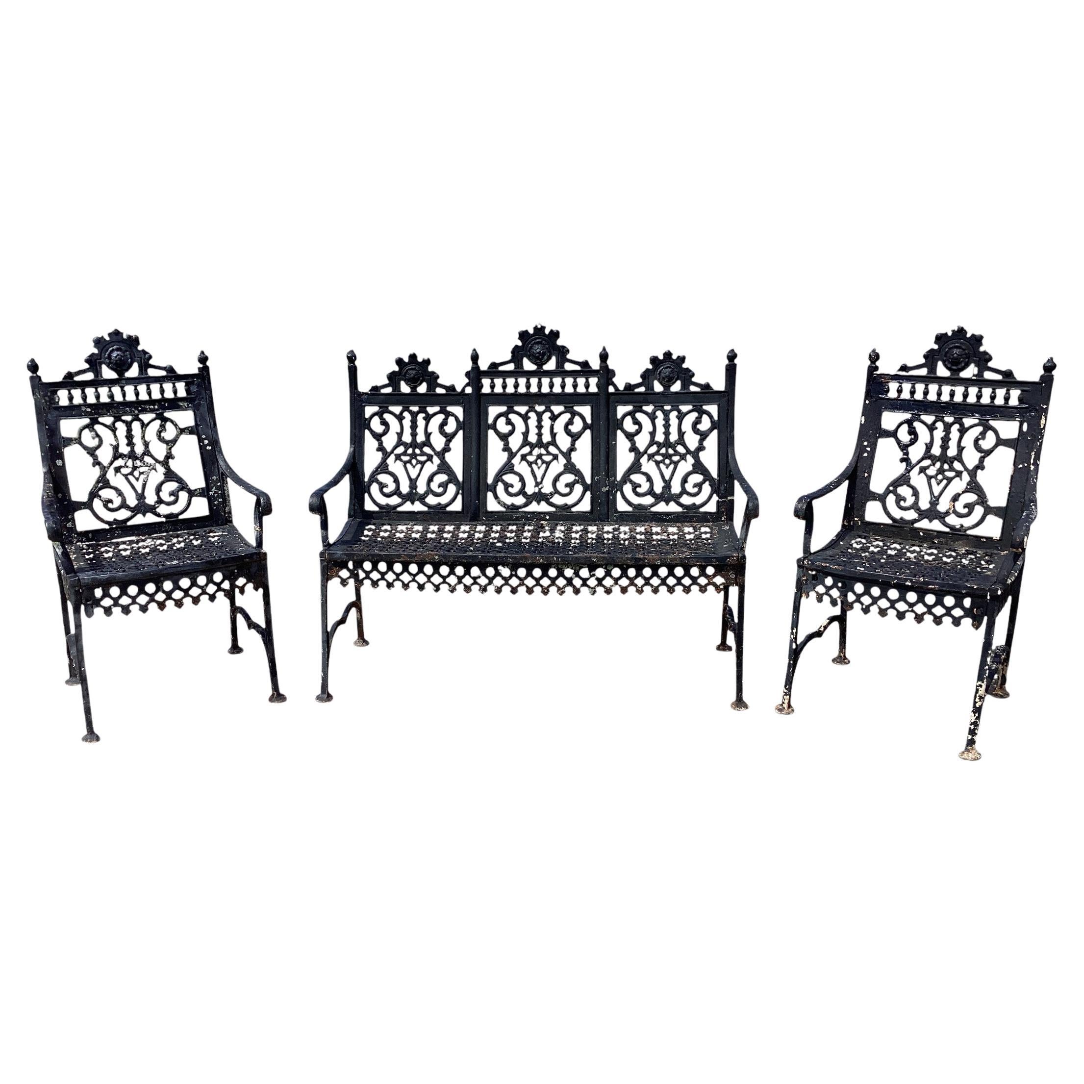 Conjunto de muebles de jardín victorianos de hierro fundido de finales del siglo XIX