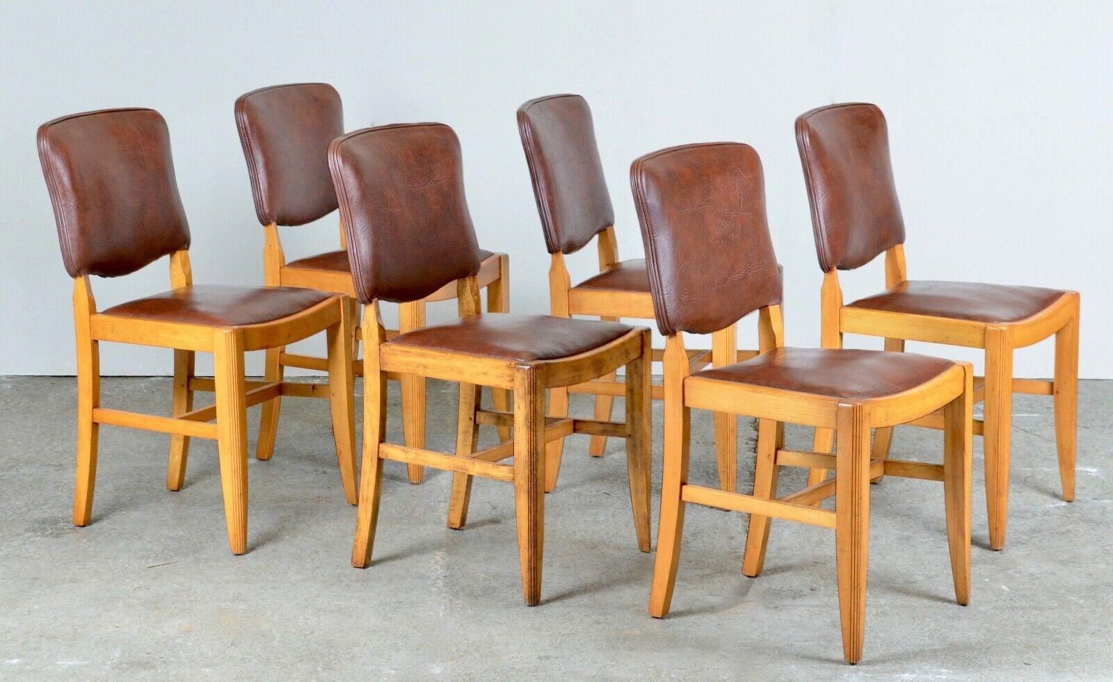 We are delighted to offer for sale this vintage suite of six brown leather and walnut dining chairs. These chairs are in very good condition, the backs and seats are comfortable and an attractive set for any dining room.

DIMENSIONS 

Height :
