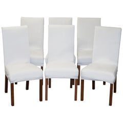 Suite de six chaises de salle à manger contemporaines en cuir bicast et housses faites sur mesure