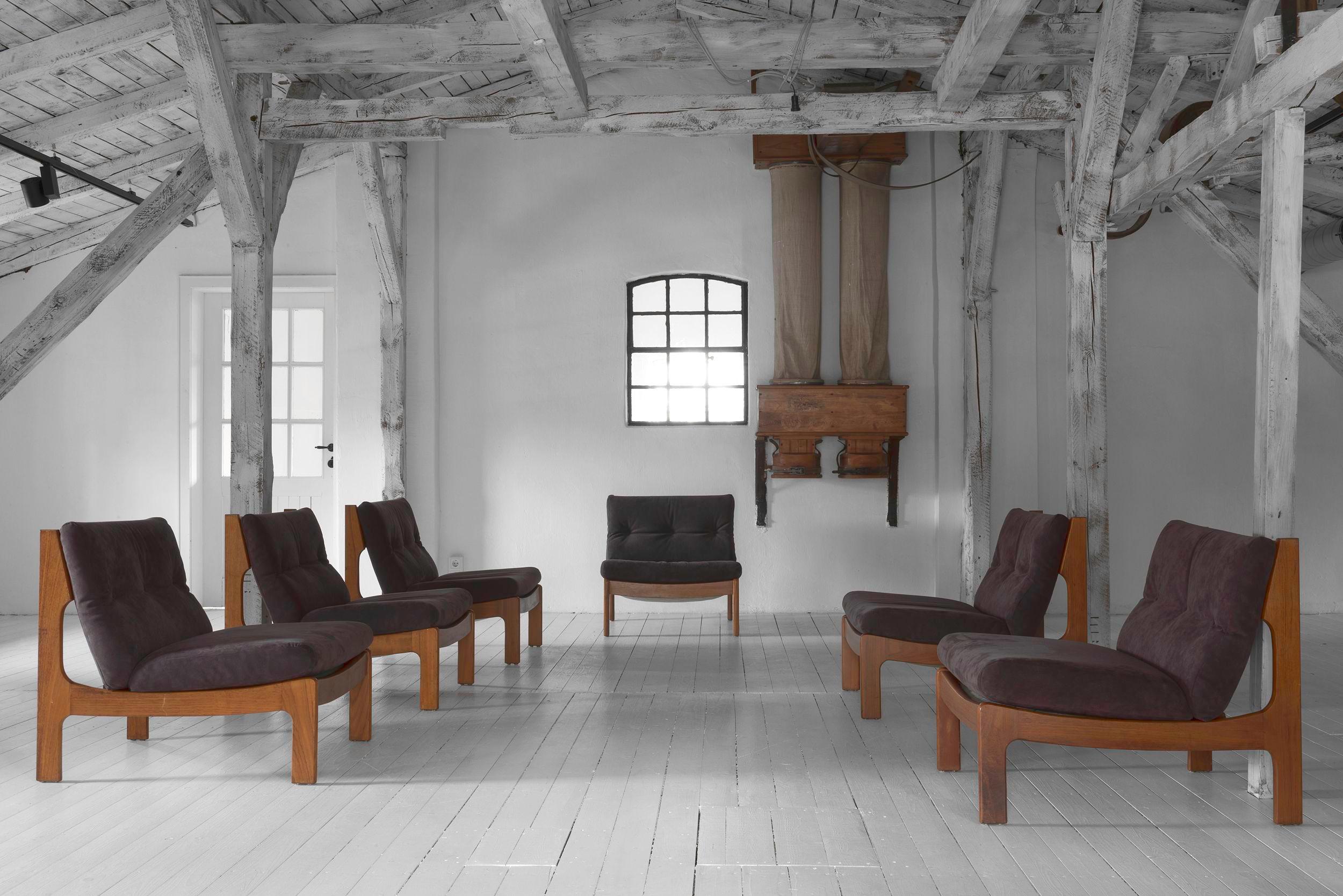 Chic set of six lounge chairs, would look stunning in a bouclé but work equally well with their ultrasuede upholstery.
