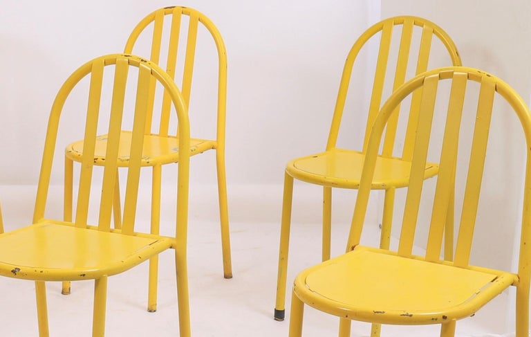 Lacquered yellow, with metallic tubular structure and backrest with metal blades and metallic seat.
Period: 20th century.
Dimensions: H 82, L 40, D 46 cm.