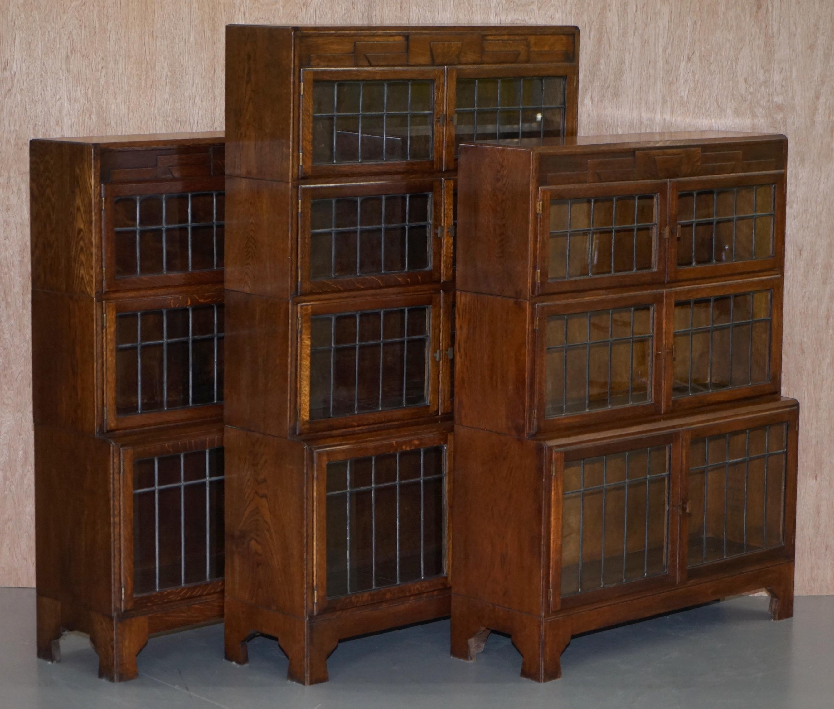We are delighted to offer for sale this lovely suite of three early circa 1920 fully restored Minty oxford stacking legal bookcases in solid oak made in the Art Deco style

A very good looking and well-made set, there were a number of companies