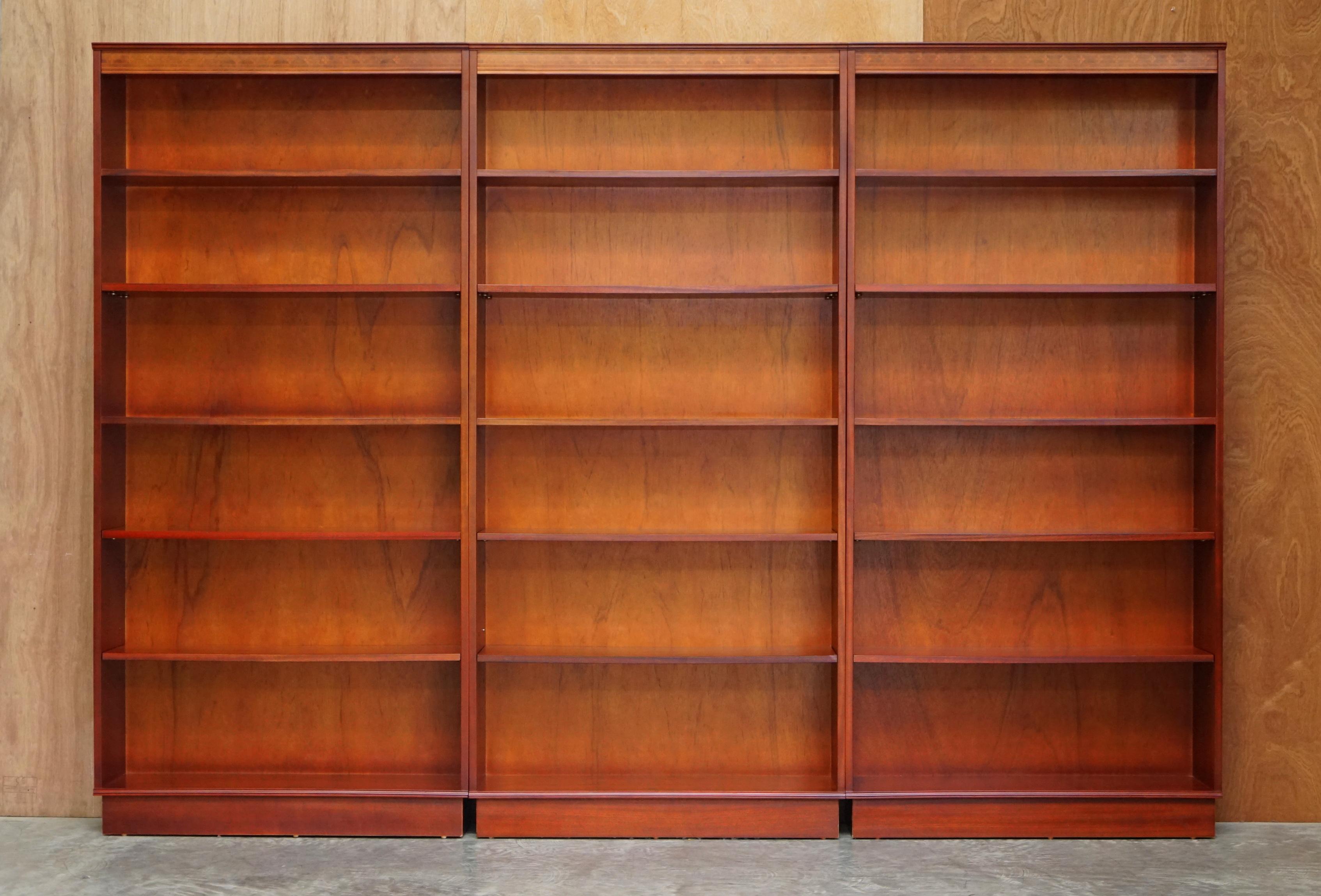 We are delighted to offer for this lovely suite of three vintage flamed mahogany finish Beresford and Hicks library bookcases

A very good looking well made and decorative set, the shelves are a mix of two fixed and three height adjustable, the