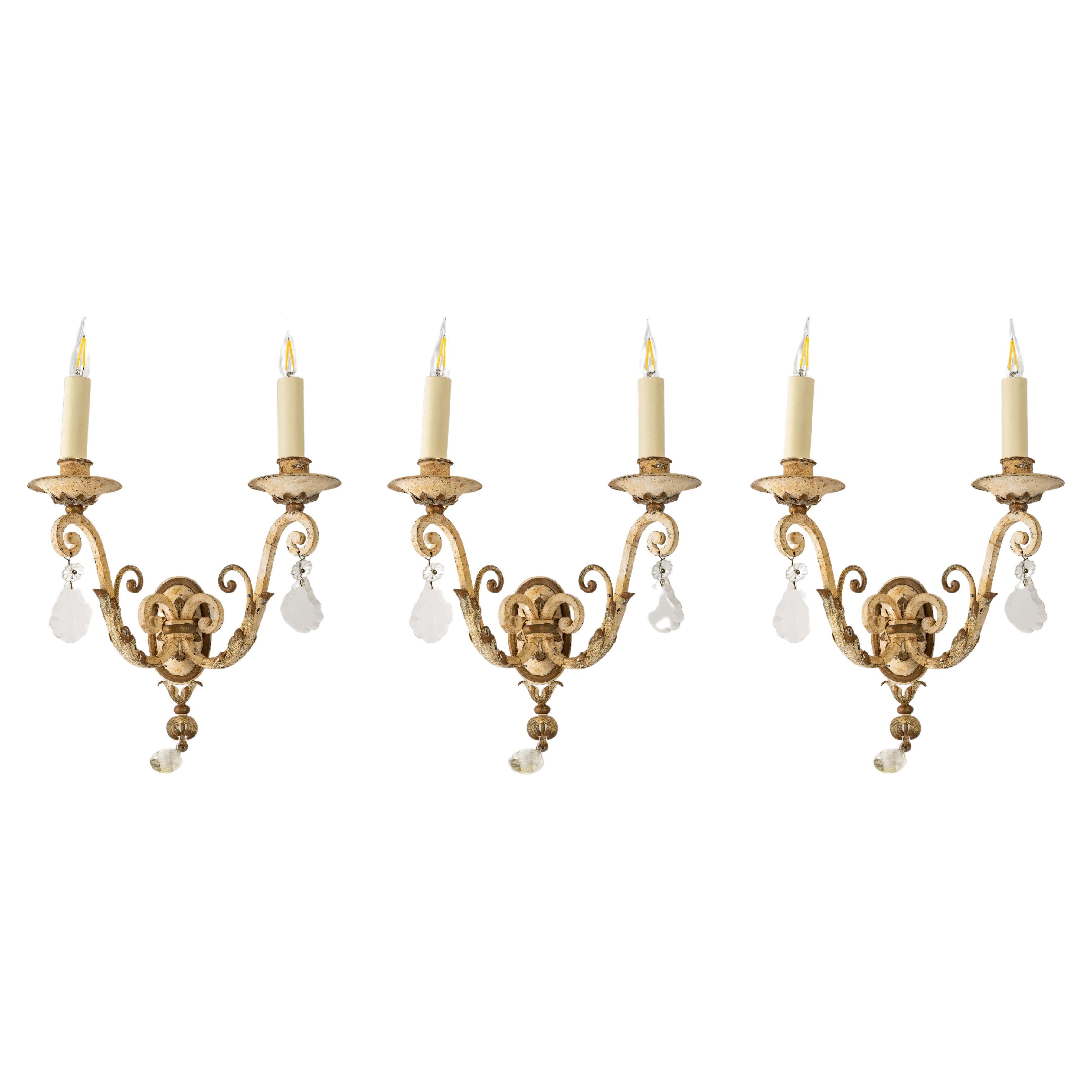 Suite of Three Wrought Iron Sconces, Early 20th Century For Sale
