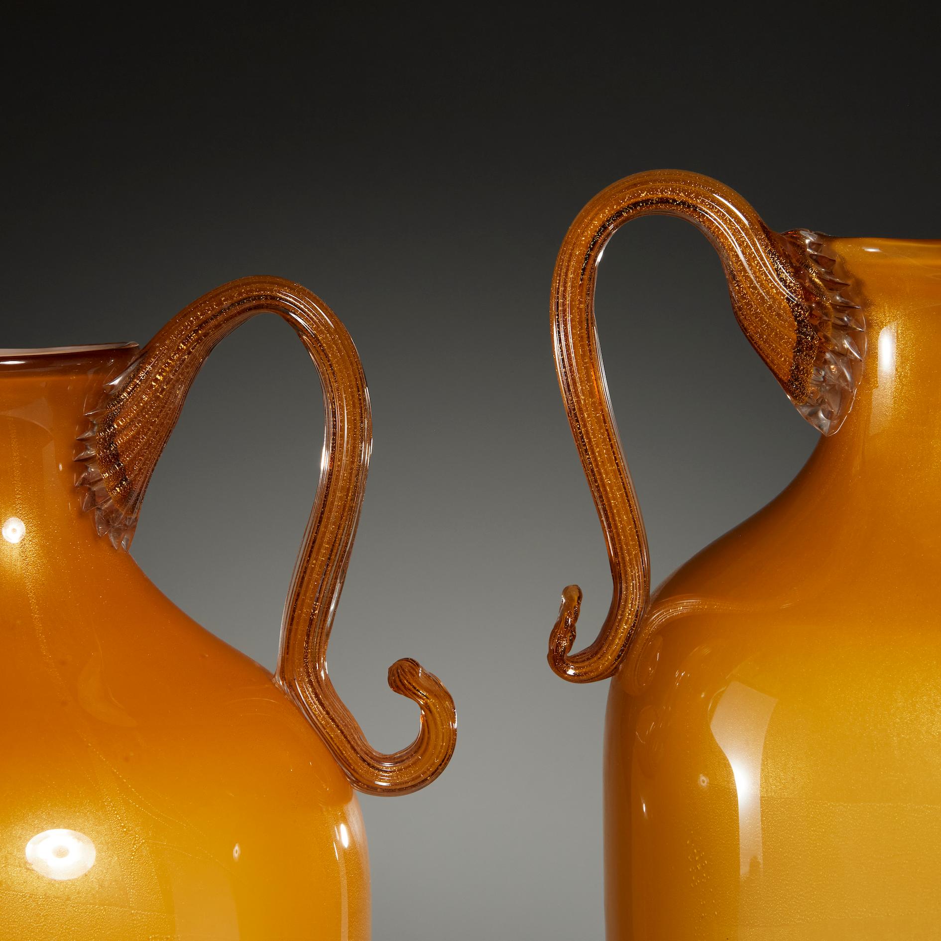 Suite of two Murano Amber with gold flecks glass urns by Stefano Toso
Signed etched: