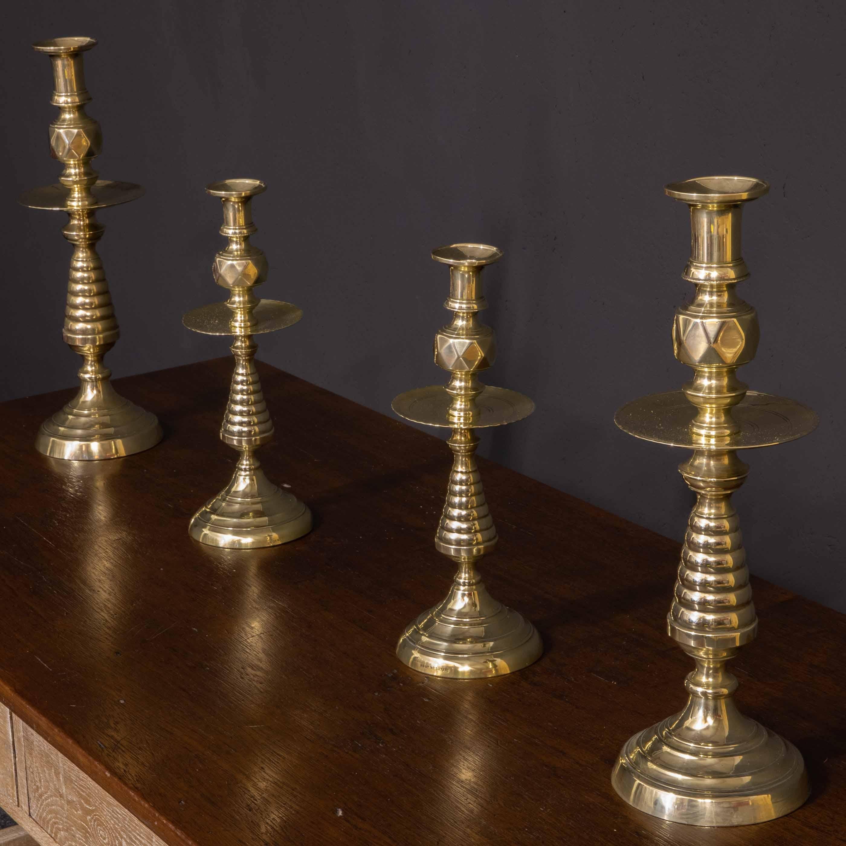 Late 19th Century Suite of Victorian Brass Candlesticks