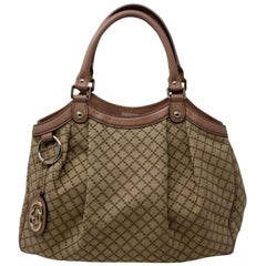 Sukey Hobo Brown Monogram Canvas Shoulder Bag