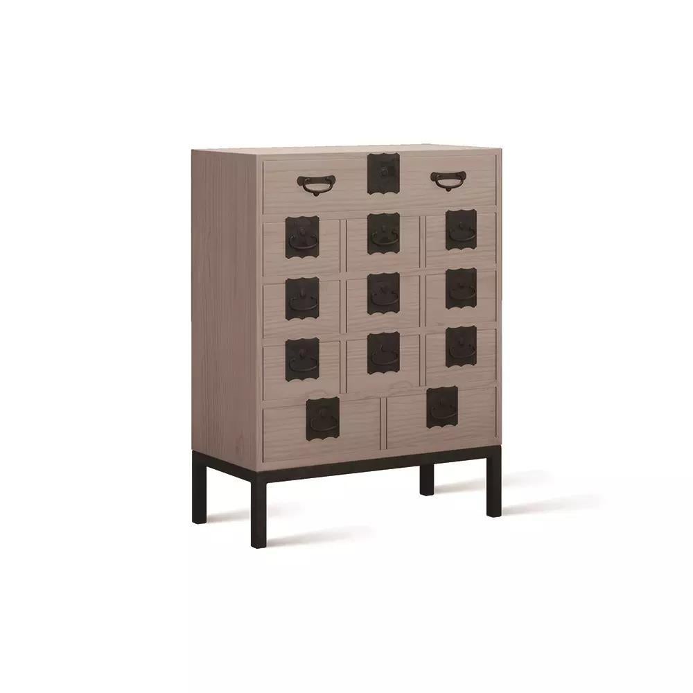Elegant, durable and versatile, the Sukiya presents storage solutions steeped in traditional Japanese tea house aesthetics. Featuring several drawers for utility and organization, this Tansu embodies traditional Japanese Design with a modern