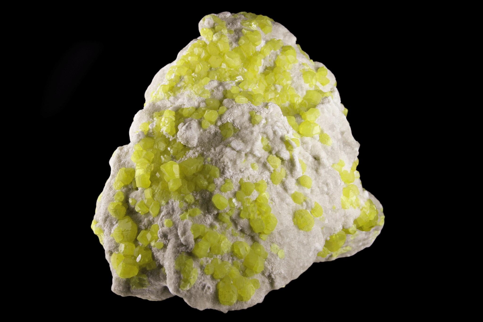 From Agrigento, Sicily, Italy

 

Massive specimen of scintillating white aragonite covered with a cluster of gem translucent blocky bright yellow sulfur crystals.

 

16.85 lbs , 9'' x 7'' x 6''