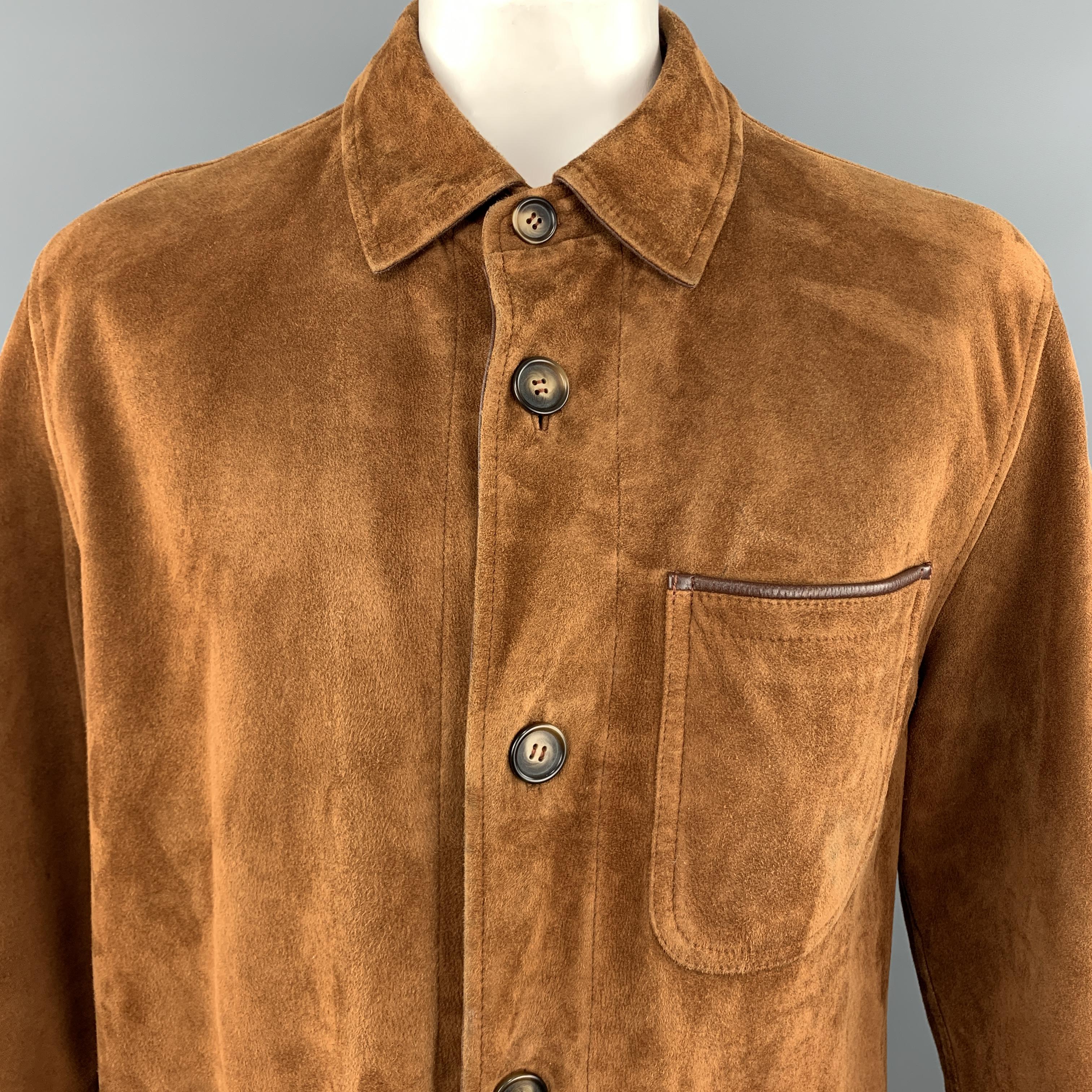 SULKA coat comes in warm tan suede with brown leather piping, pointed collar, patch pockets, and half liner. Imperfections throughout suede. As-is. Made in Italy.
 
Very Good Pre-Owned Condition.
Marked: IT 50
 
Measurements:
 
Shoulder: 20
