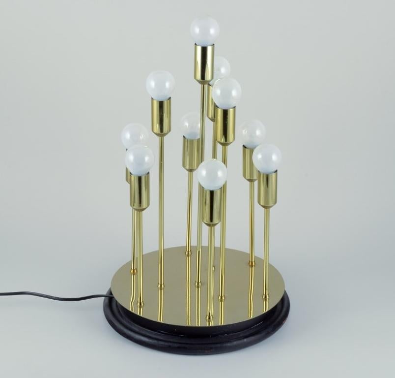 Sülken Leuchten, Germany. Modernist lamp for ten bulbs. Brass on wooden base In Excellent Condition For Sale In Copenhagen, DK