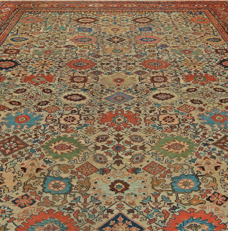 Authentic 19th Century Sultanabad handwoven wool rug
Size: 12'7