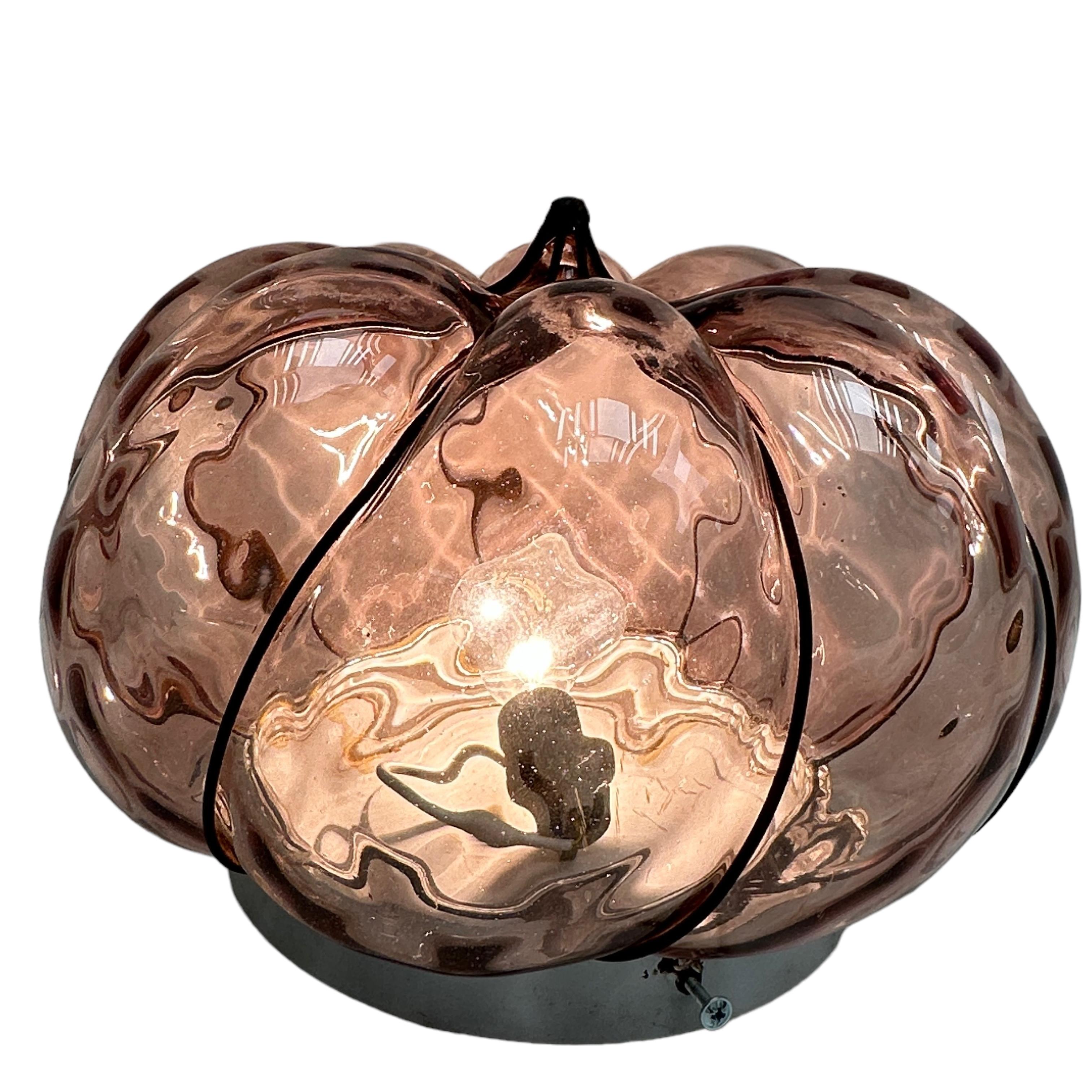 A hand blown Italian flush mount, fabulous Venetian caged iridescent light lilac or dark pink glass in a iron frame. it can also be used as wall sconce as the globe are held tight to the fixture with screws. It is in fabulous vintage condition and