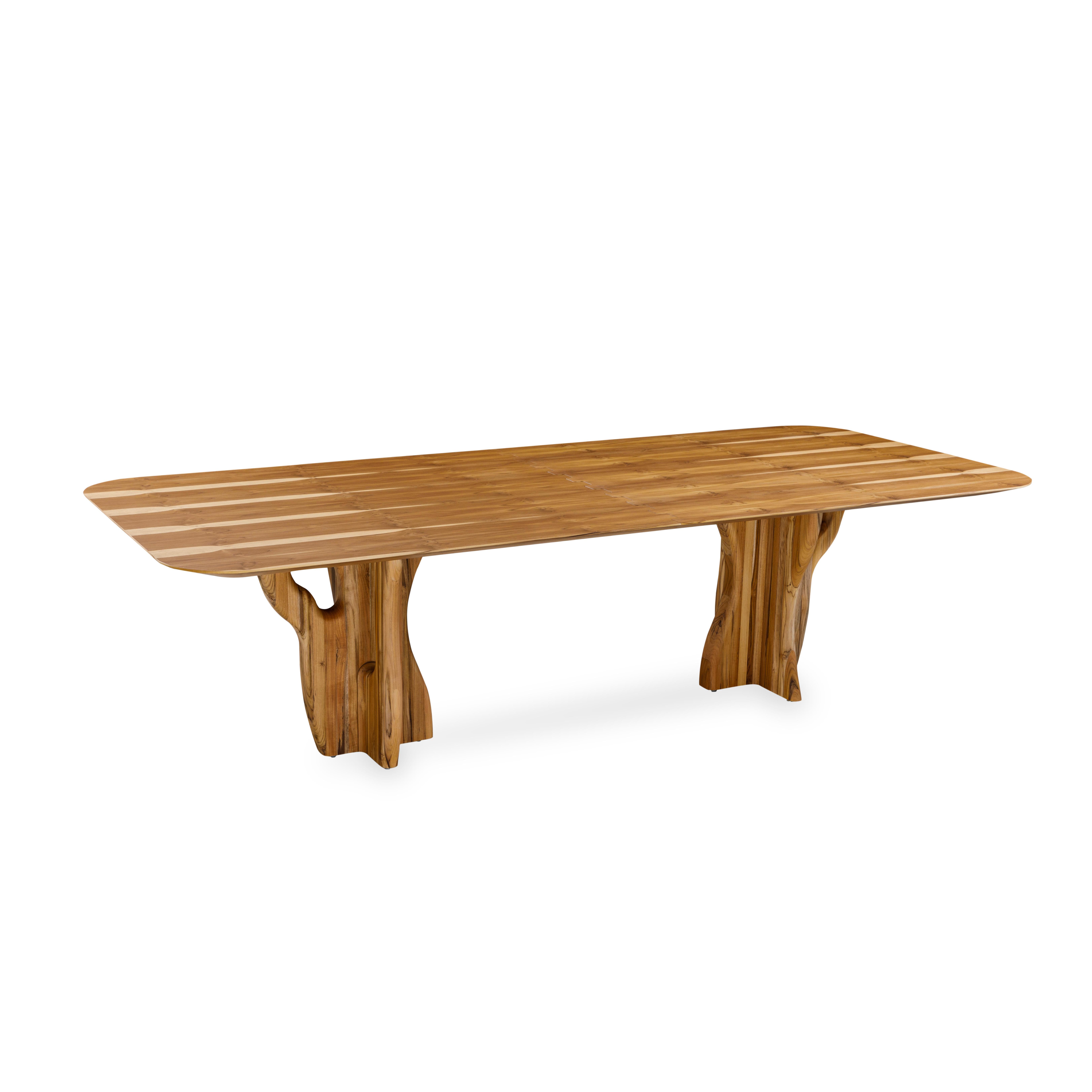 Uultis design team has manufactured the Suma dining table in a teak veneered finish top with organic solid wood legs, perfect for your dreamed dining space. This is a piece that is designed to be used during meals and gatherings, and it is also
