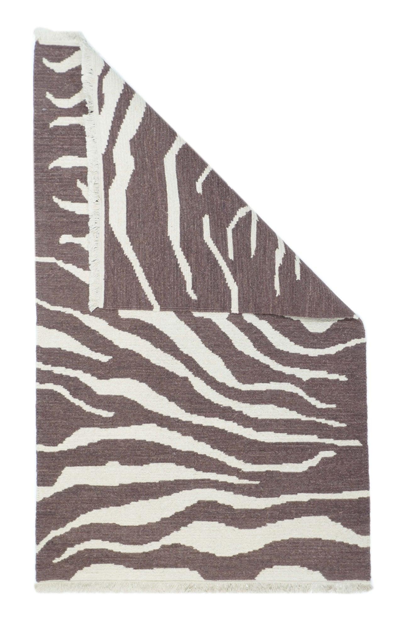 Sumak Rug 3'1'' x 4'11''. A technique rather than a specific type, in which warps are wrapped by colored wefts to create a pattern. Caucasian, Turkish, Persian and other types.  Produces a flat surface, pileless rug which may be turned over for