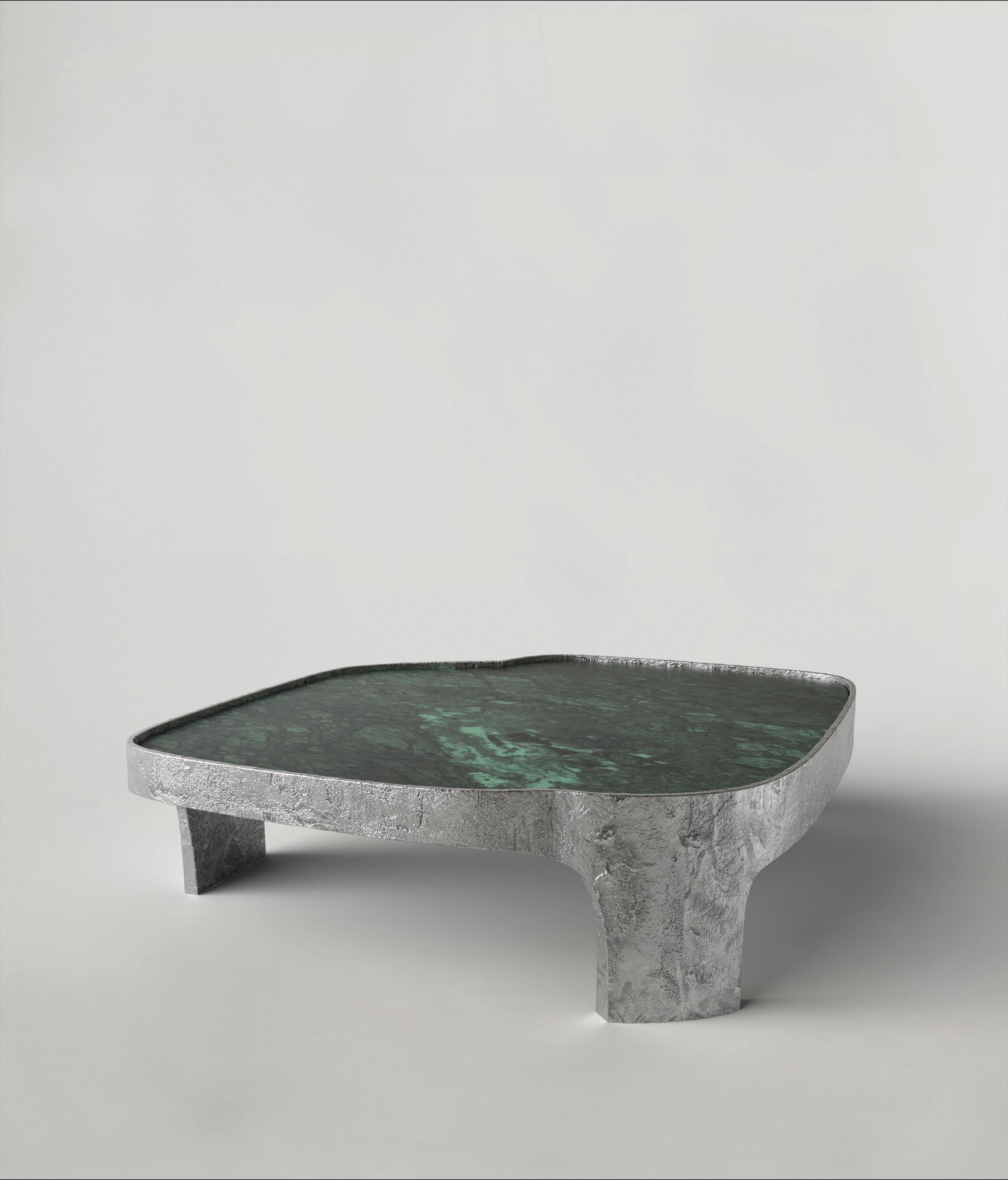 Sumatra V2 low table by Edizione Limitata
Limited Edition of 15 + 3 pieces. Signed and numbered.
Dimensions: D100 x W100 x H30 cm
Materials: Aluminum + Verde Guatemale Marble

Sumatra is a 21st Century collection of tables made by Italian artisans