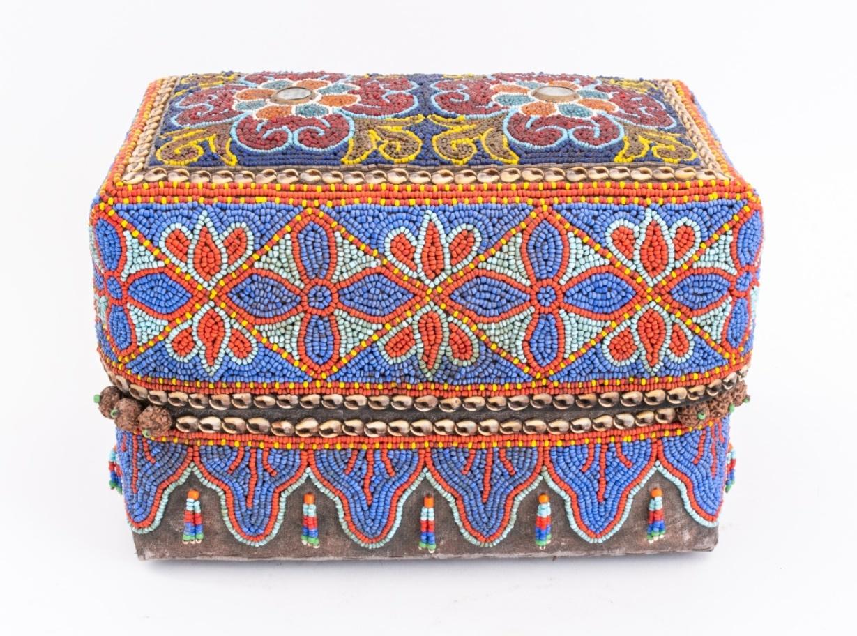 Sumatran beaded boxes, a group of nine (9) rectnagular and square boxes from the villages of Benkulu and Lampung in South Sumatra, Indonesia, each with geometric beading and cowrie shell decoration over wove grass structures, 6.5