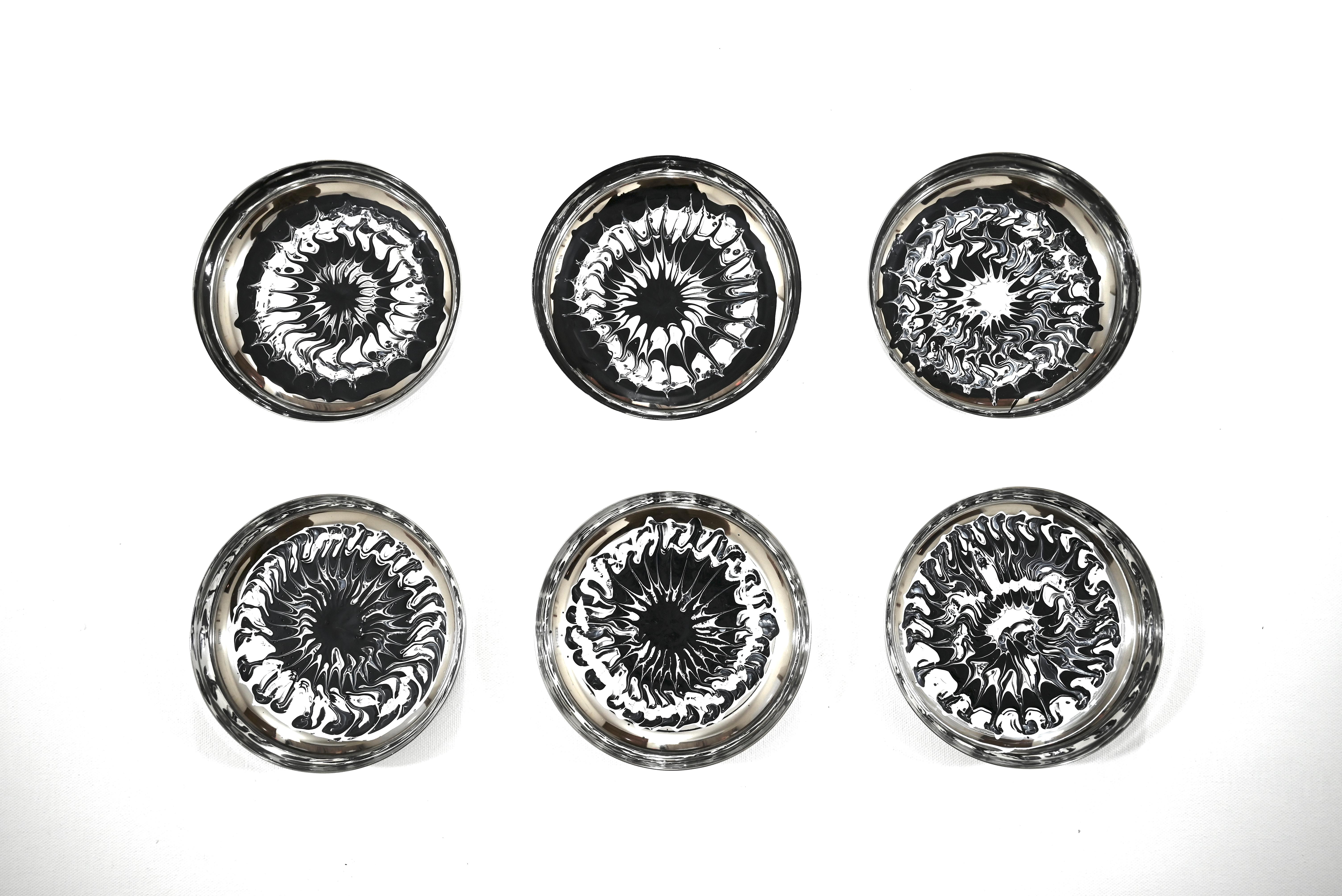 Six Stainless steel discs measuring 5.1x5.1x1.5 inches each (13x13x4 cms) hung individually on the wall with a 3M velcro tape hanging provision on the back of each disc, can be hung in any way as a set of six.

Sumit Mehndiratta is an Indian artist