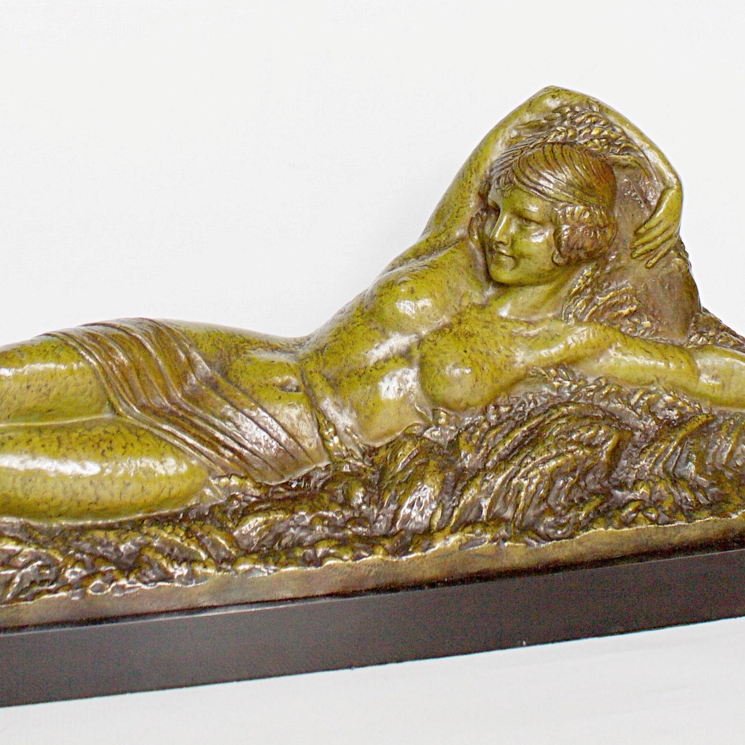 Summer, an Art Deco Bronze sculpture by Demétre Chiparus. Also known as Nu allongé dans les blés (Lying nude in the Wheat) depicts a woman lying nude amongst the summer wheat. Excellent original green patination with Fine hand chased detail. Signed