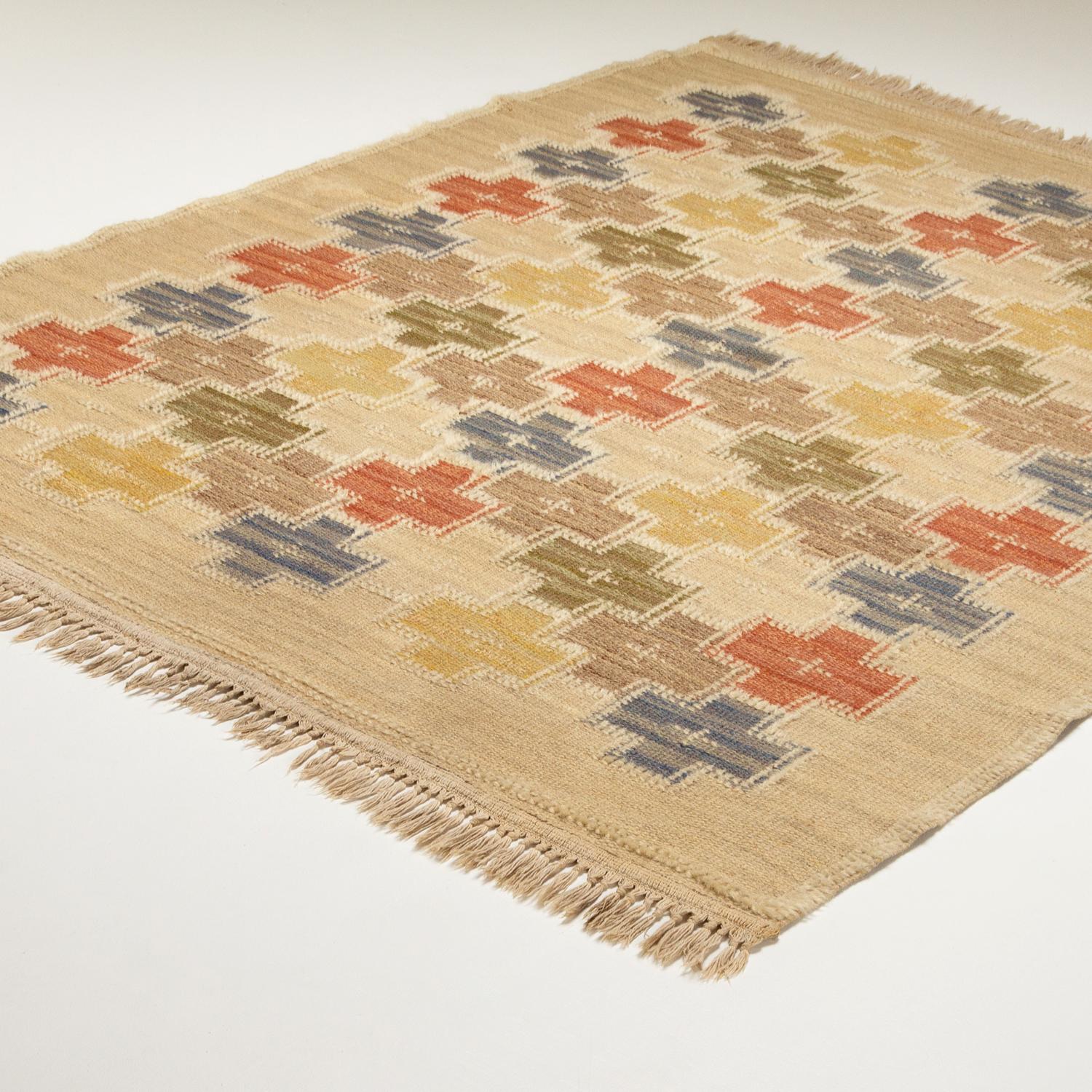 An early example of ‘Summer’, a Swedish flat weave rölakan designed and hand woven by Age Faith-Ell for SKLH – Södra Kalmar Läns Hemslöjd (Southern Kalmar County Craft Association) – Sweden. Designed in 1942 this example dates from 1944. ‘1944’ and