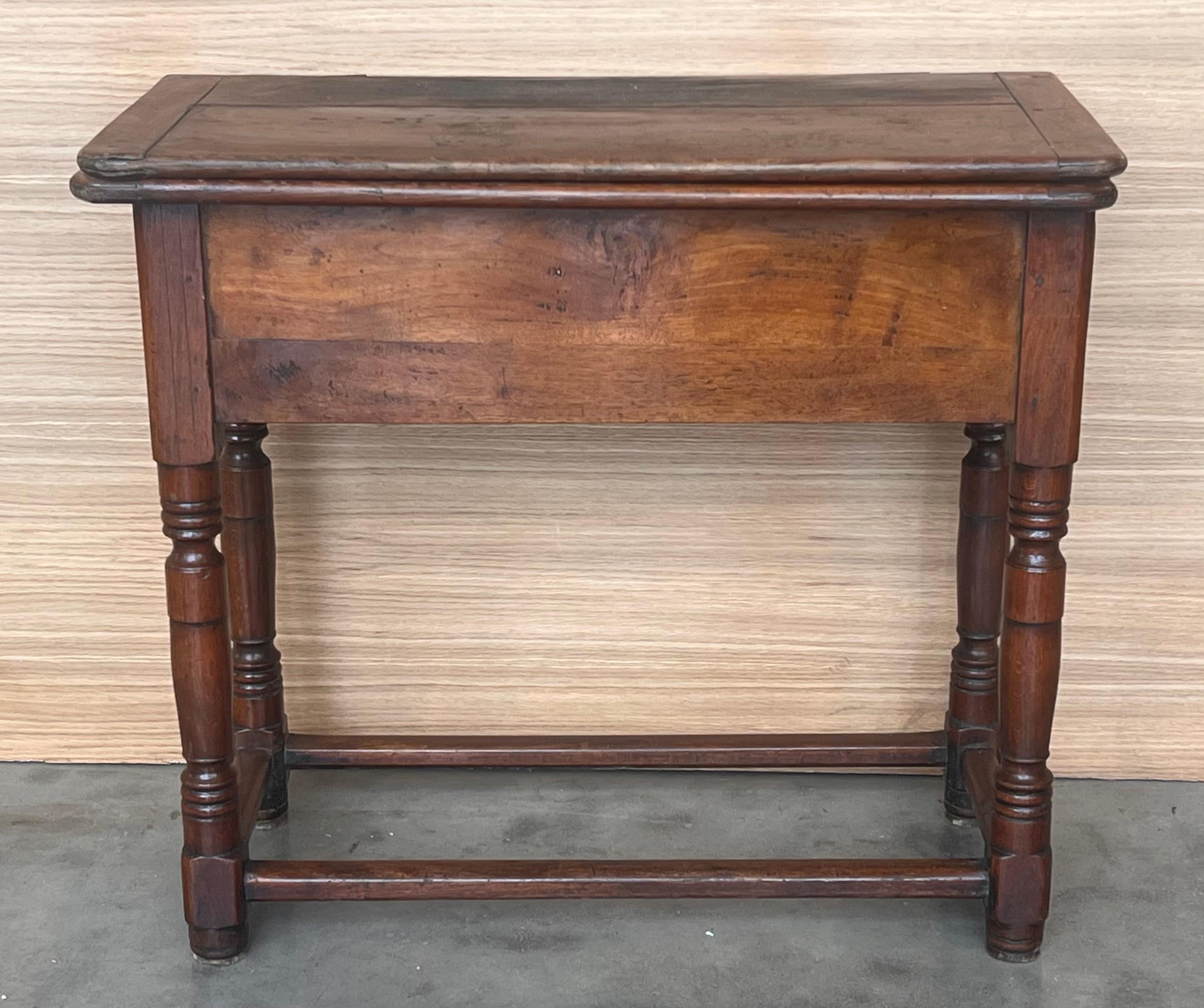 Square Folding oak side table with Carved legs and carved top and edges. 
It´´s a typical summer table of the Spany´s countrys.
The table has four legs and you can easily open the top and it has vey stability .
Restored and very functional piece.