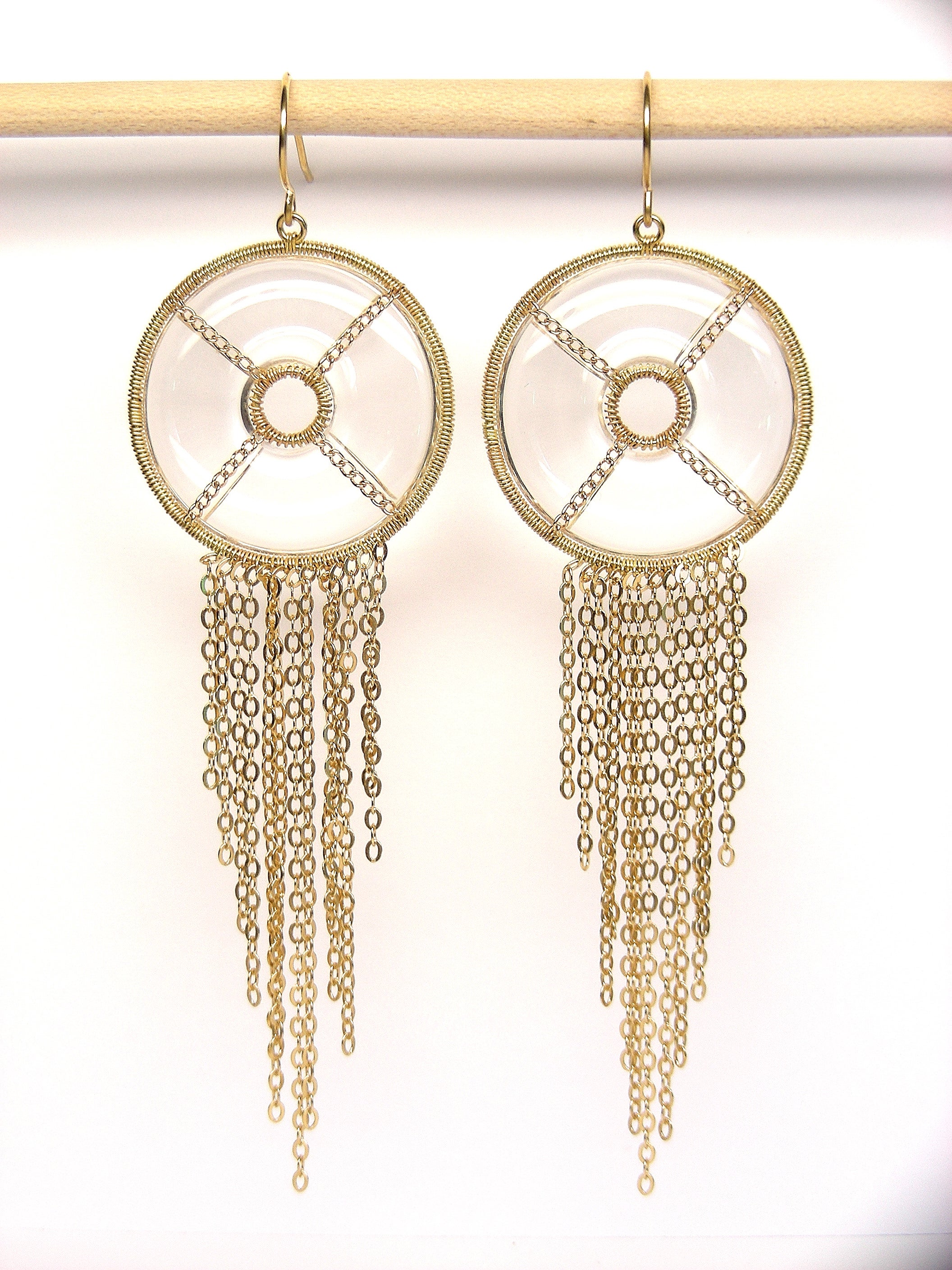 Summer Splash is a collection of easy to wear, fashion oriented hoop earrings to wear with lightness, chic and glam only this pieces for this collection 
Hoop 18k Gold Earrings with Clear Onyx Central Round  Mandala 
They come in 6 variations of