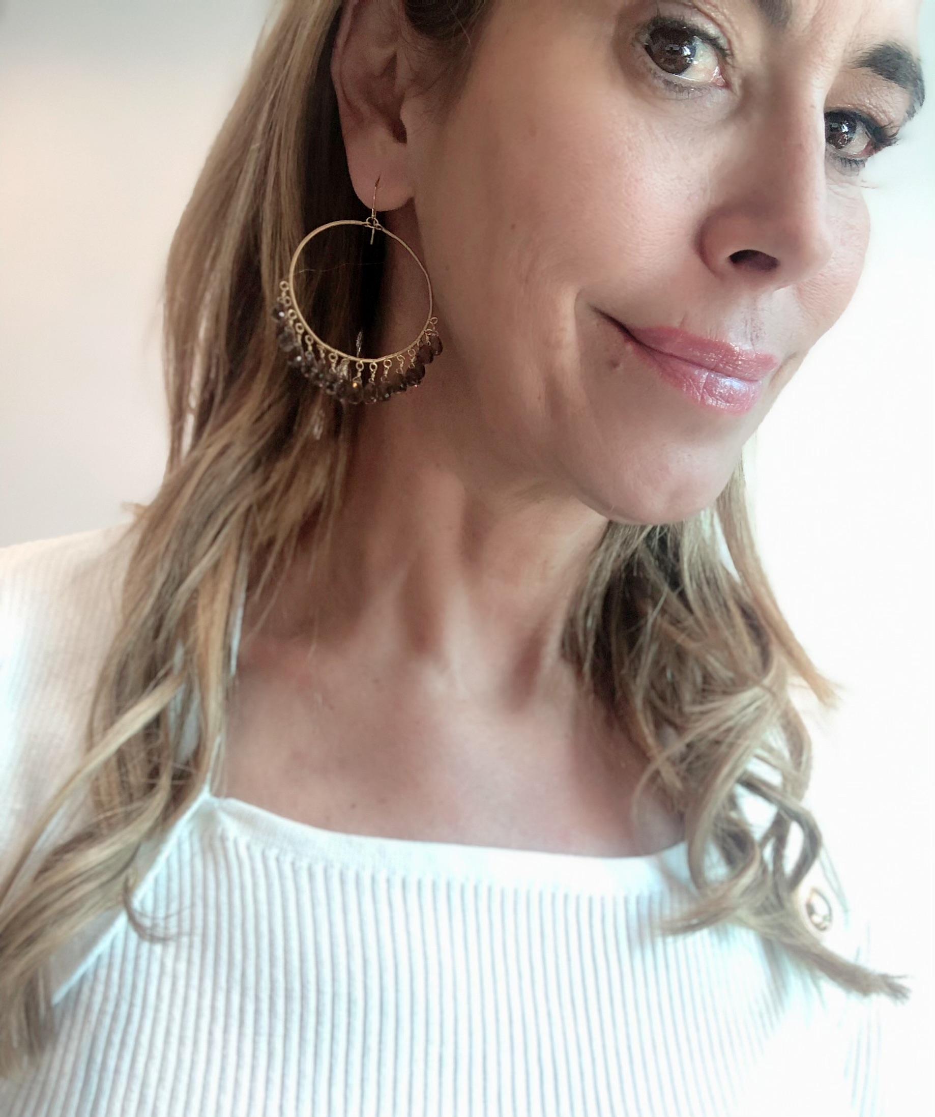 Summer Splash is a collection of easy to wear, fashion oriented hoop earrings to wear with lightness, chic and glam only this pieces for this collection 
Summer Splash Hoop 18k  Gold Earrings with Briolets of  Fumé Quartz 
Made in 100% 18kt gold and