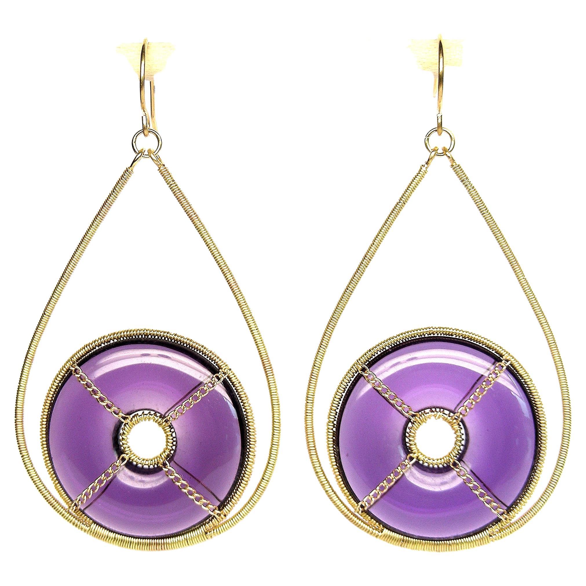 Hoop 18k Yellow Gold Earrings with Violet ametyst crystals and black onyx
Summer Splash is a collection of easy to wear, fashion oriented hoop earrings to wear with lightness, chic and glam only this pieces for this collection 
They come in 6