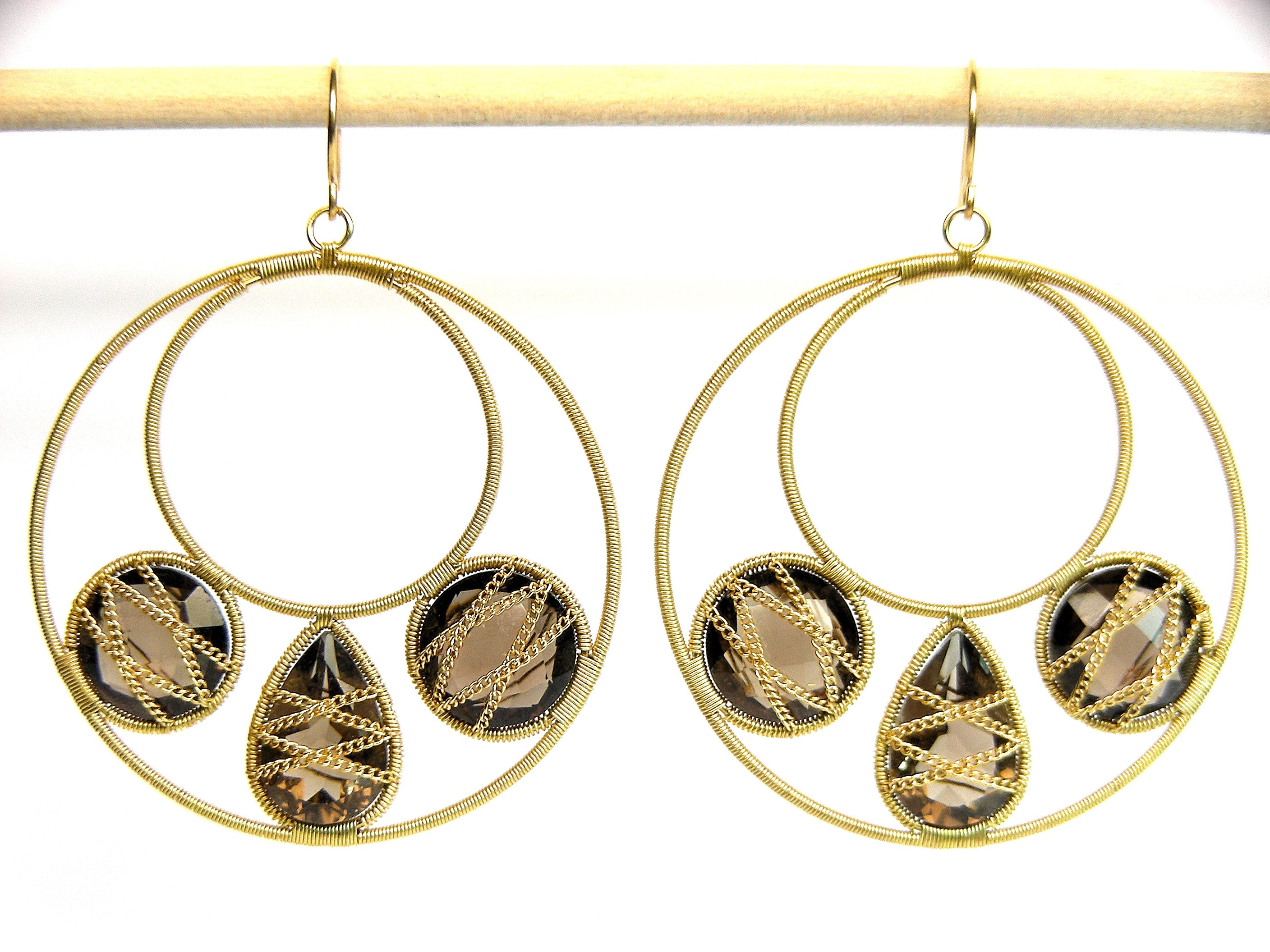 Hoop 18k Yellow Gold Earrings with smoked quartz motifs 3 motif mandala
Summer Splash is a collection of easy to wear, fashion oriented hoop earrings to wear with lightness, chic and glam only this pieces for this collection 
They come in 6