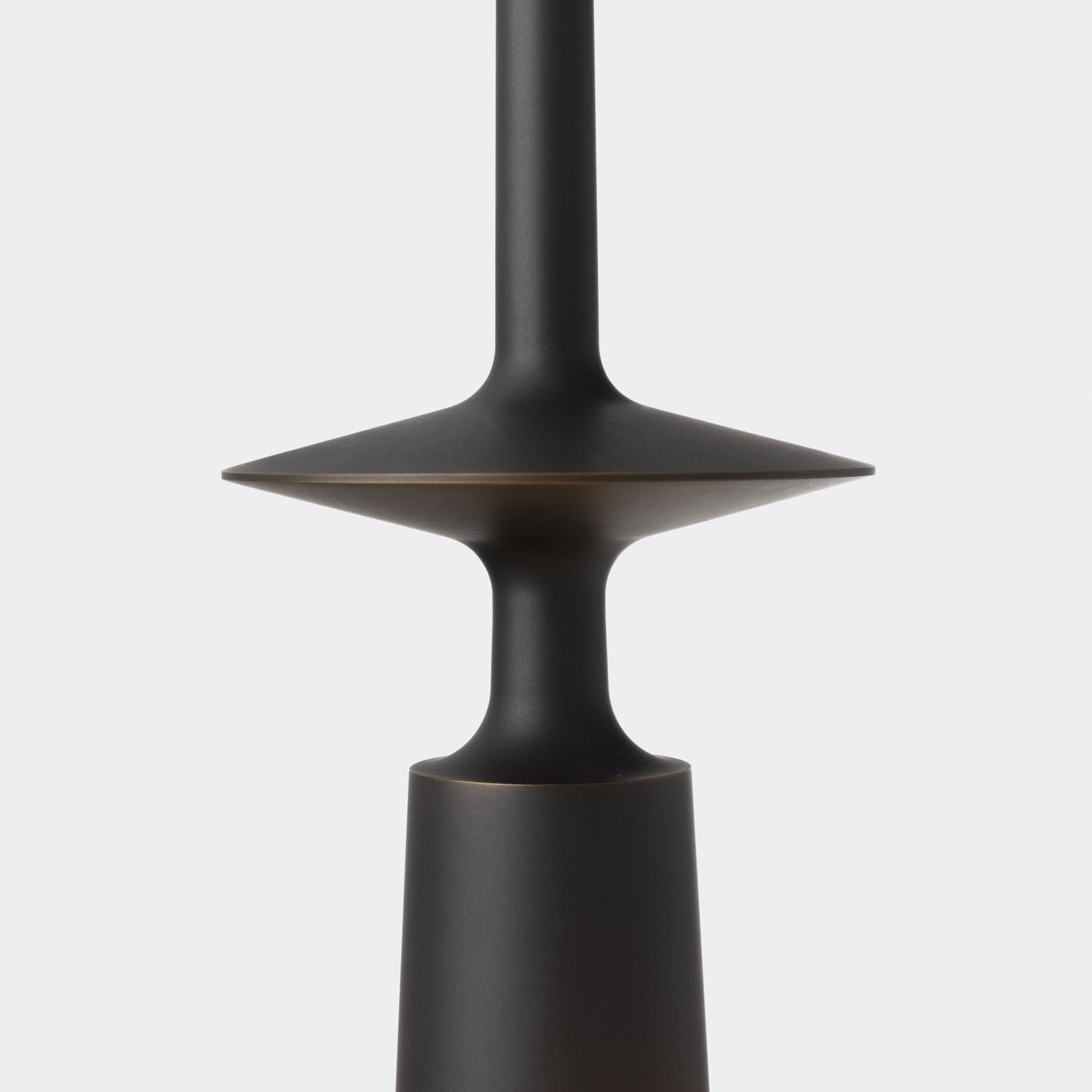 Our Summit Pendant has a stylish personality. Its seemingly simple form showcases the beauty of machined metal, and acts to cast light both up and down.